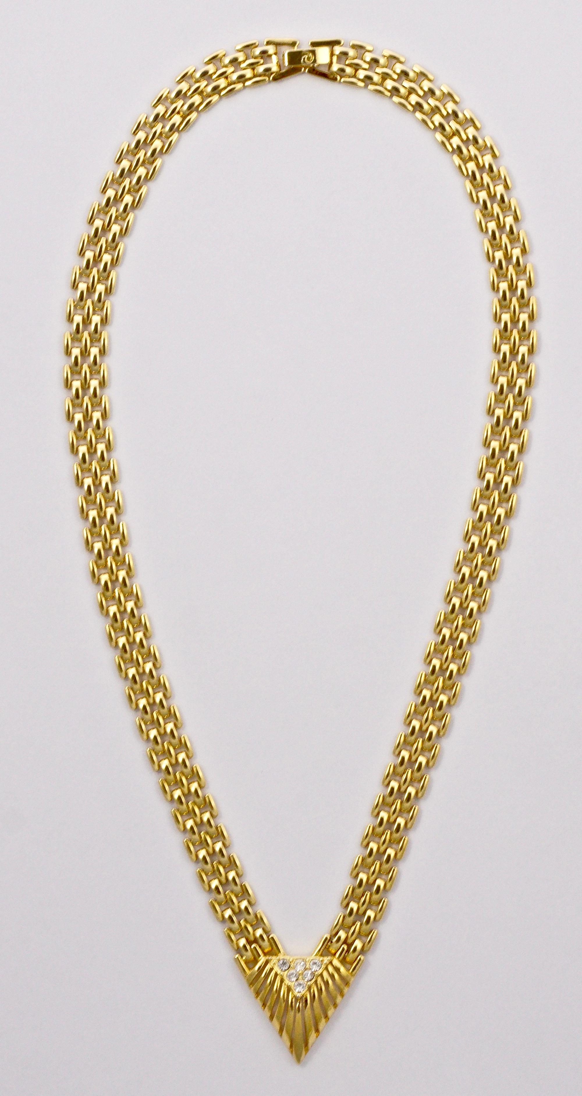 Stylish Pierre Cardin Art Deco inspired gold plated necklace, bracelet and earrings, featuring lovely woven shiny link chain, and clear rhinestones. The bracelet is length 17.8cm / 7 inches, the necklace is length approximately 45.7cm / 18 inches,
