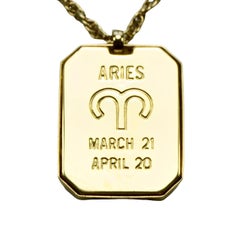 Pierre Cardin Gold Tone Aries Zodiac Pendant Necklace set with a Diamond