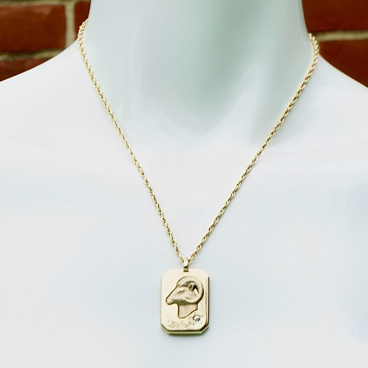 Pierre Cardin Gold Tone Aries Zodiac Pendant Necklace set with a Diamond In Good Condition For Sale In London, GB