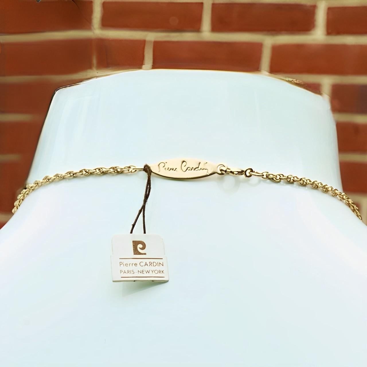 Pierre Cardin Gold Tone Aries Zodiac Pendant Necklace set with a Diamond For Sale 1