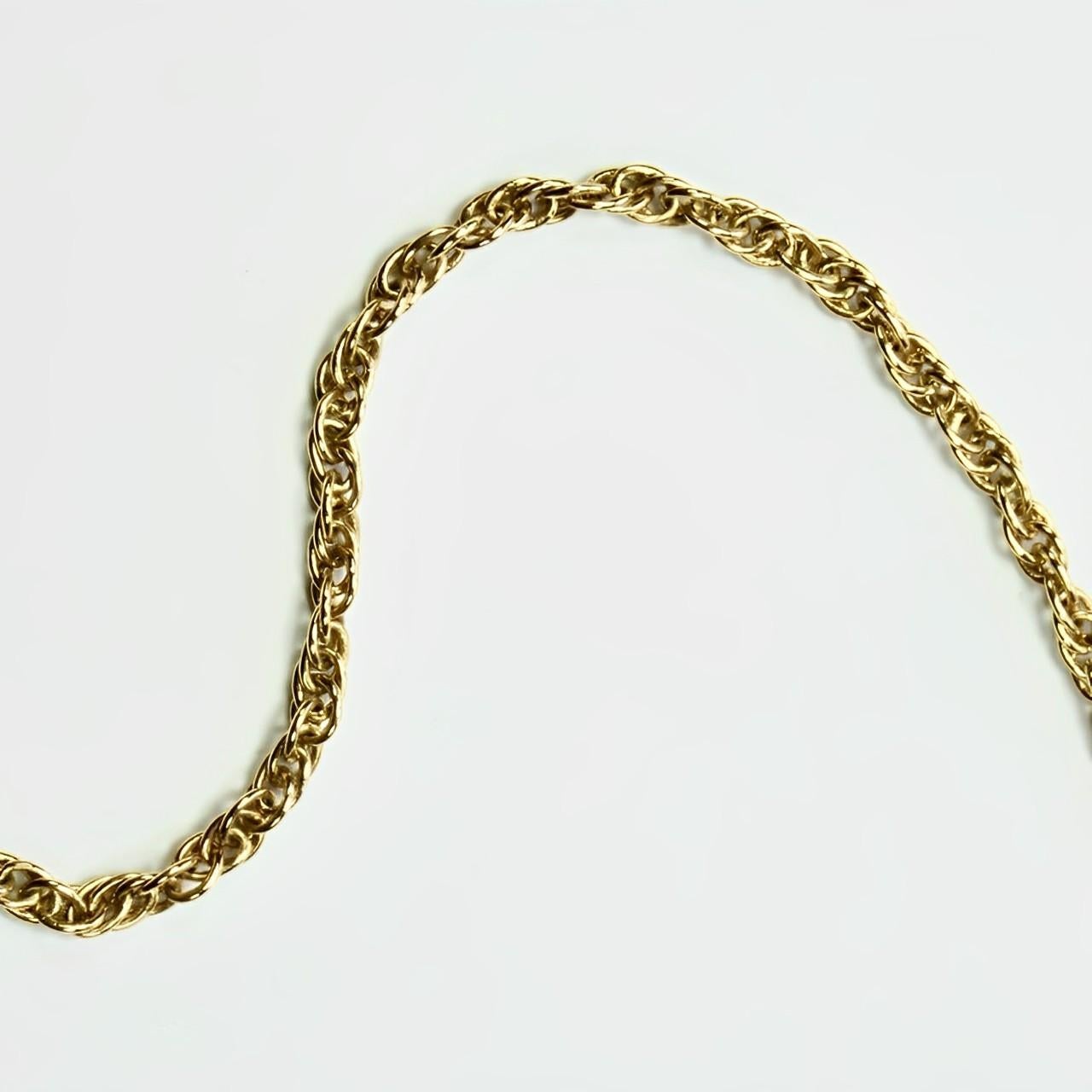 Pierre Cardin Gold Tone Aries Zodiac Pendant Necklace set with a Diamond For Sale 4