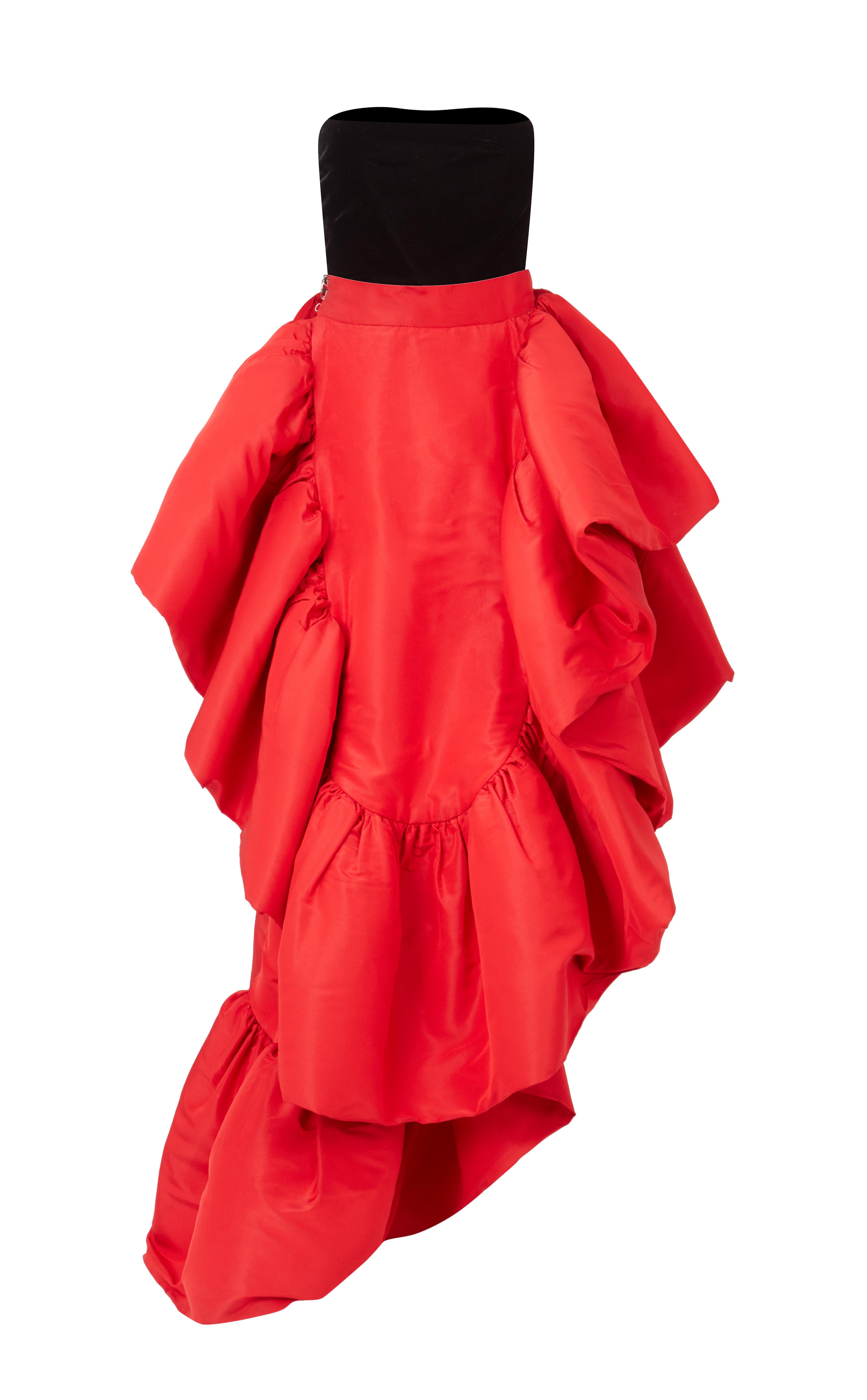 Pierre Cardin haute couture, with black velvet mini strapless dress and red ruffles skirt shorter on the front.
