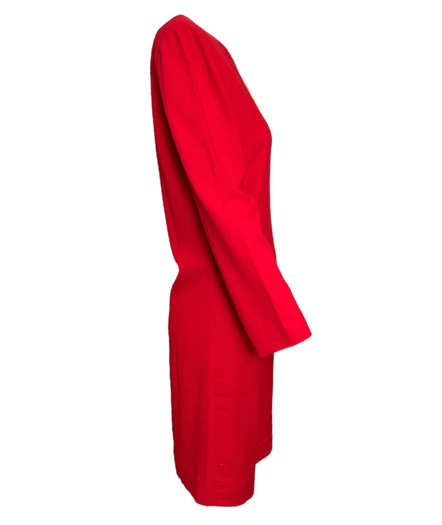 Un altro capolavoro anni '80 e '60 di Cardin. Un rosso perfetto e sorprendente per accentuare la natura modulare e giocosa di questo pezzo. I pad moderati anni '80 rendono questo capo più anni '60: creano una spalla audace che conferisce un'essenza