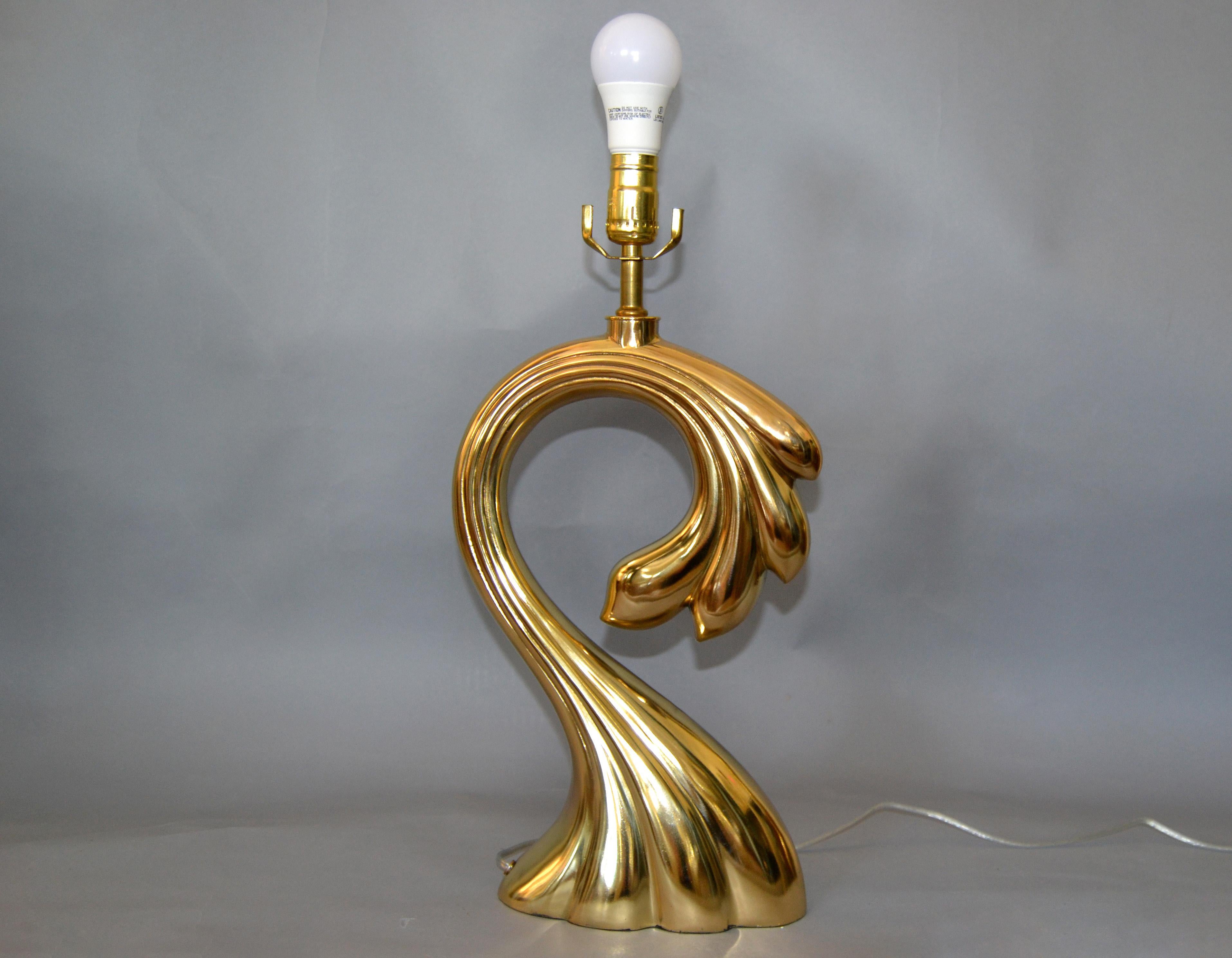 We offer a Mid-Century Modern sculptural brass table lamp from the 1970s in the manner of Pierre Cardin.
Newly rewired and uses a max. 75 watts light bulb.
Note: We have no shade, harp or finial with it.
The base is covered with felt to protect