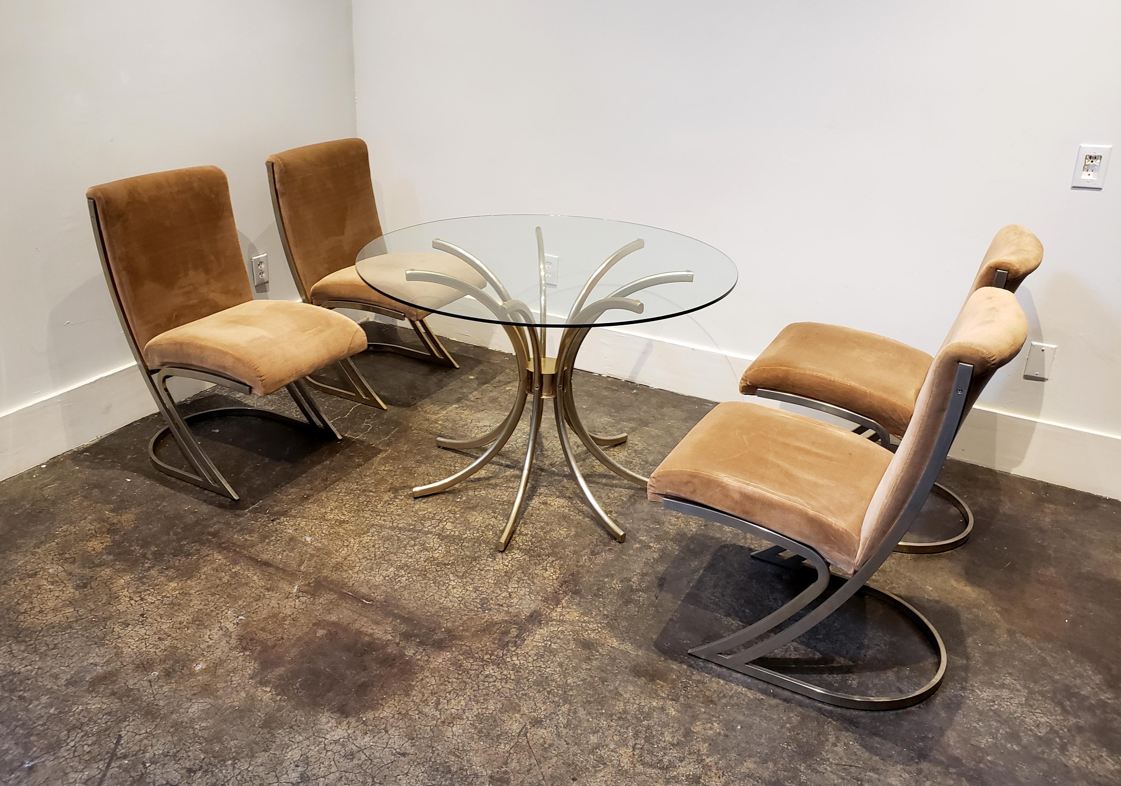 Cardin design manufactured by Basset Furniture in 1975. Dining table is a modern take on the traditional wheat shaft design, comprised of 7 curved, C-shape oval tubes attached to a central cylinder. Chairs are a sweeping z-form frame with