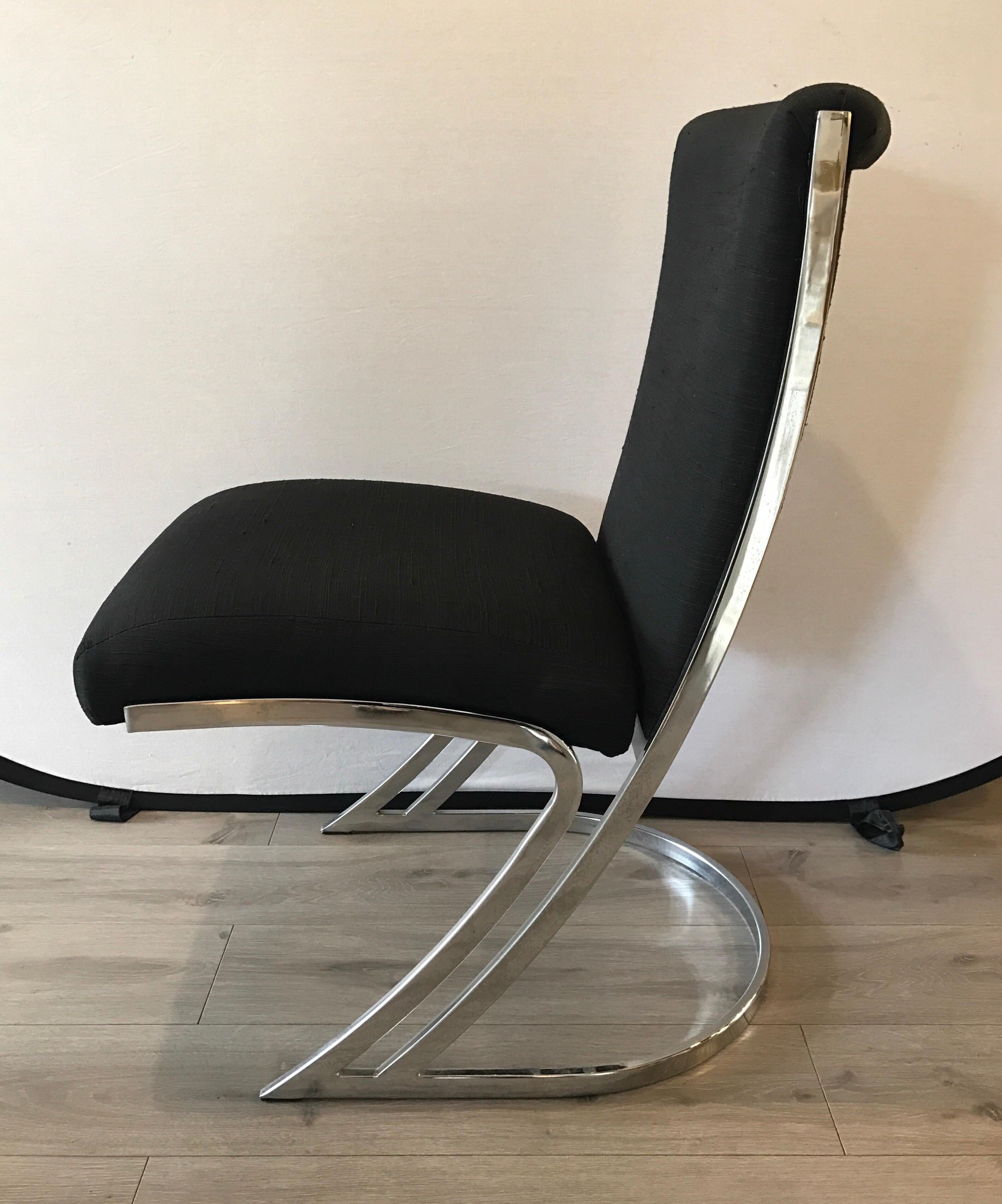 Rare Pierre Cardin midcentury Z chairs in heavy chrome and gorgeous black silk blend upholstery.