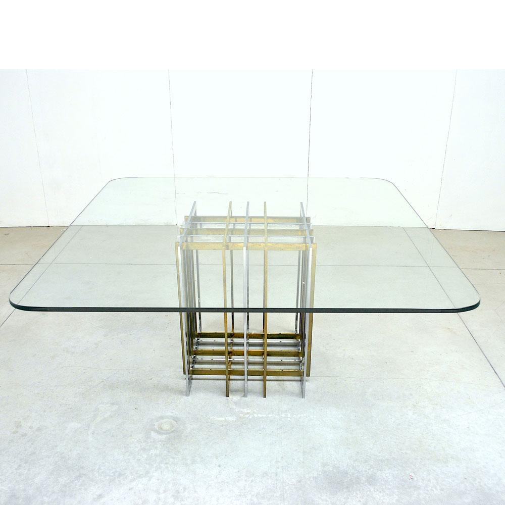 Table by Pierre Cardin from the 1970s with a particular frame in brass and steel.