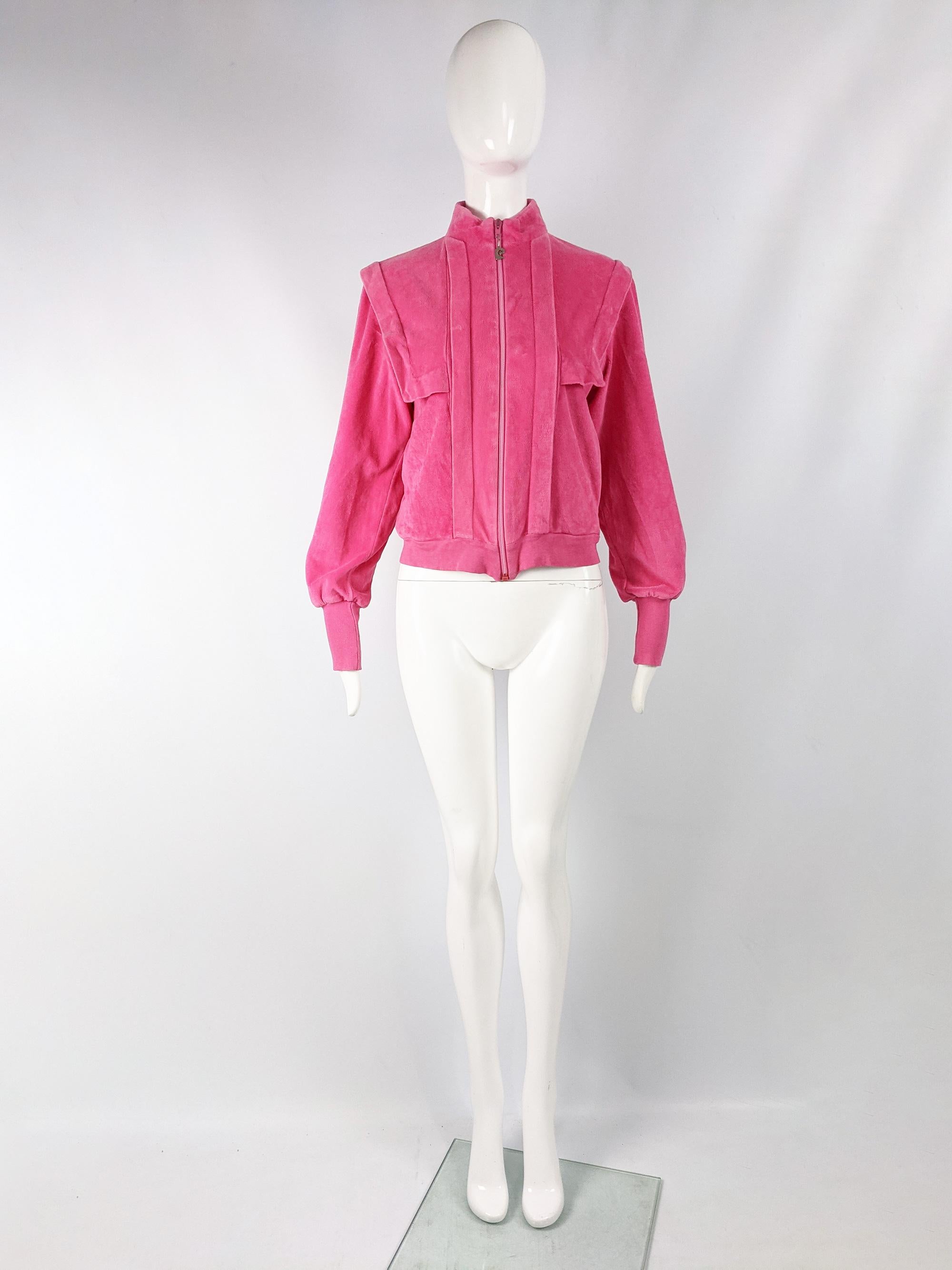 A fabulous vintage womens bomber jacket from the 80s by luxury French fashion designer, Pierre Cardin. In a pink chenille / velour with a high neck and branded zip pull. 

Size: Marked S
Bust - 38” / 96cm
Waist - 36” / 91cm
Length (Shoulder to Hem)