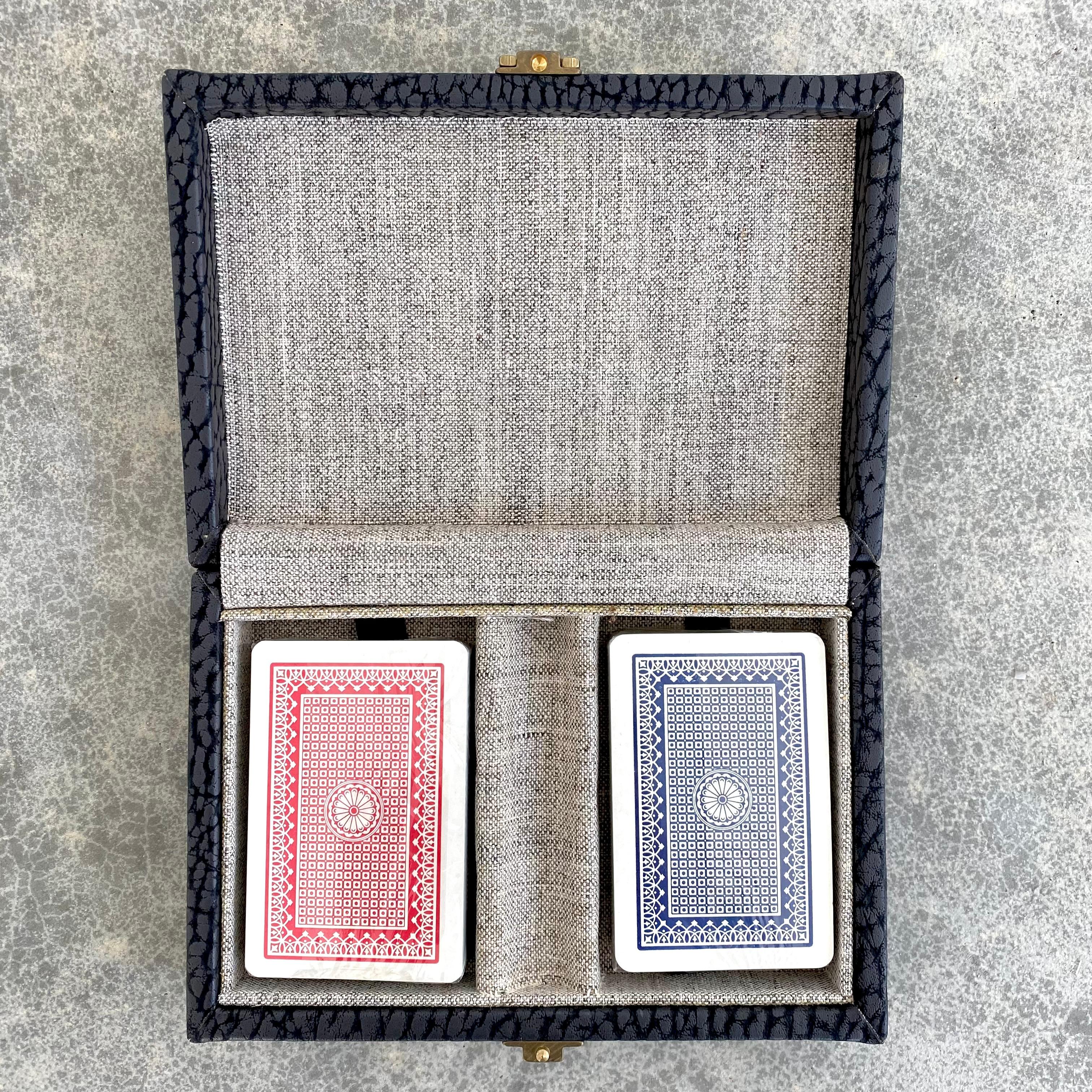 Original 1970s Pierre Cardin playing cards in a fabric case. Unused cards. Elegance and style that is common with the major fashion house and the late Pierre Cardin. A major statement and a piece from the Heyday of the house of Cardin. Fabric wraps