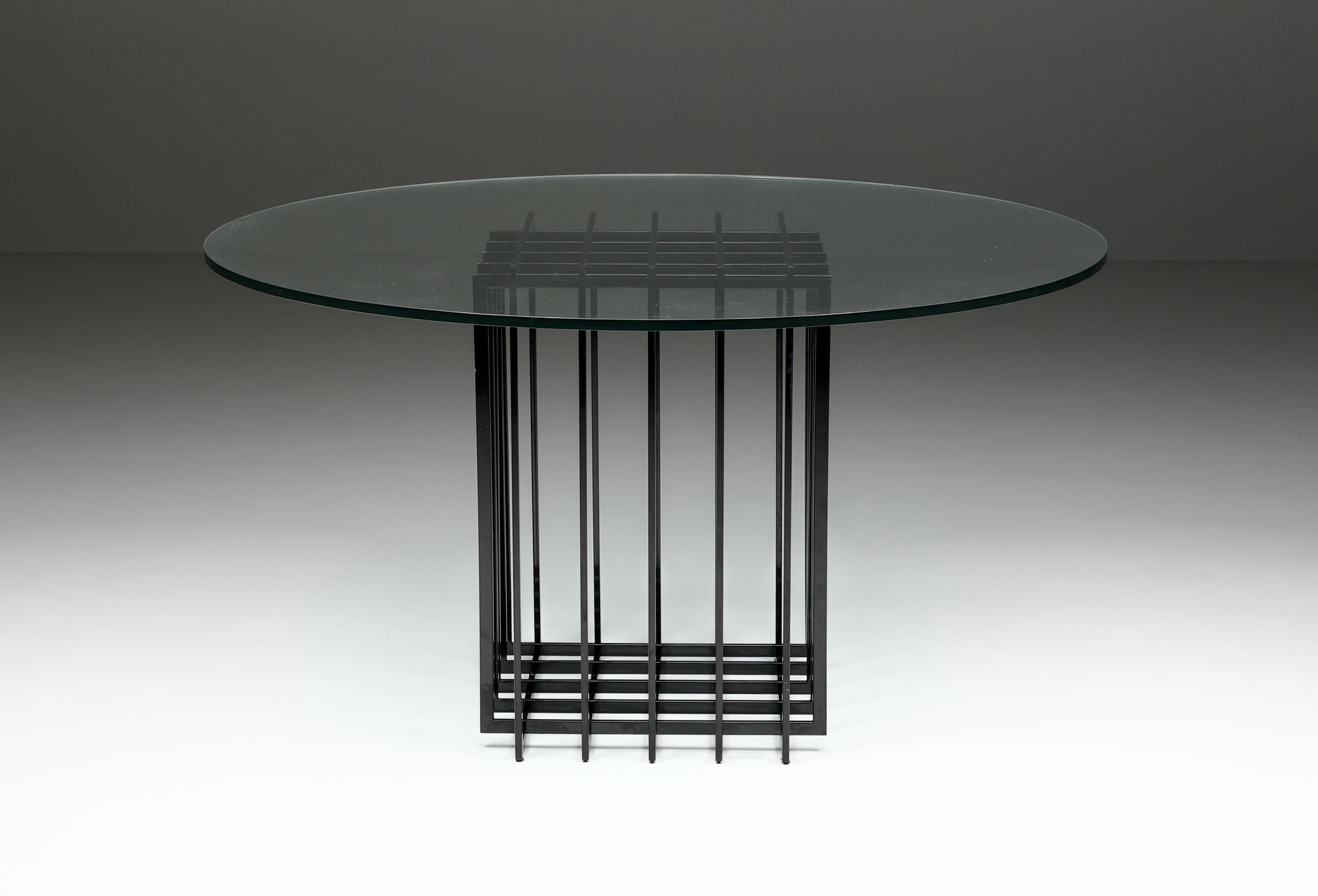 Table, in glass and metal, by Pierre Cardin, France, 1960s. 

Architectural writing or dining table by Pierre Cardin in black-coated steel. Due to the use of a grid, the table features an elegant open expression. The clear glass top beautifully