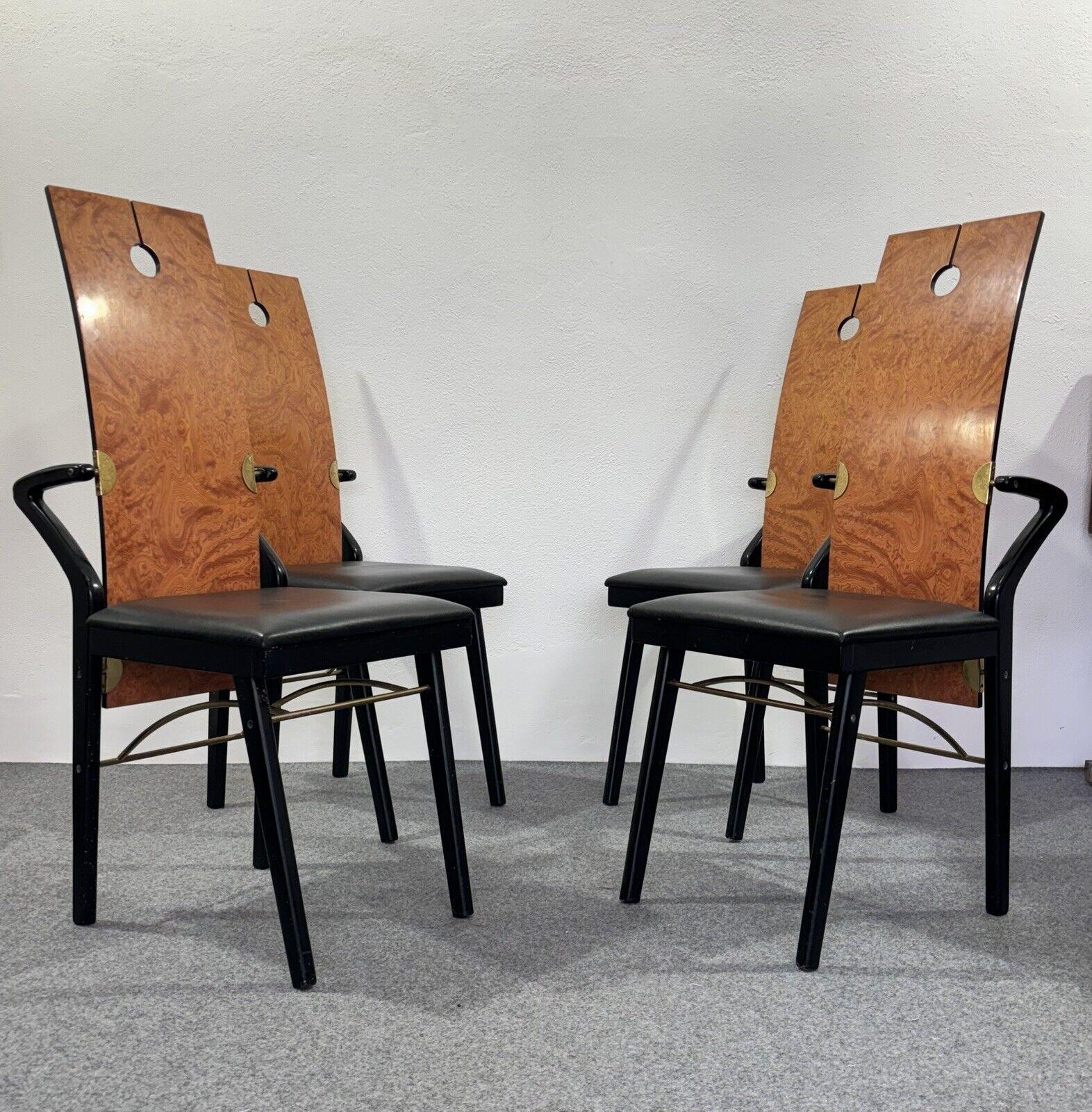 Very rare set consisting of 4 sculptural chairs by Pierre Cardin.


Chair production Italy design Pierre Cardin year 1980. Black lacquered wooden frame, wing-shaped wooden back, combined with brass details. Upholstered seat covered in black leather.