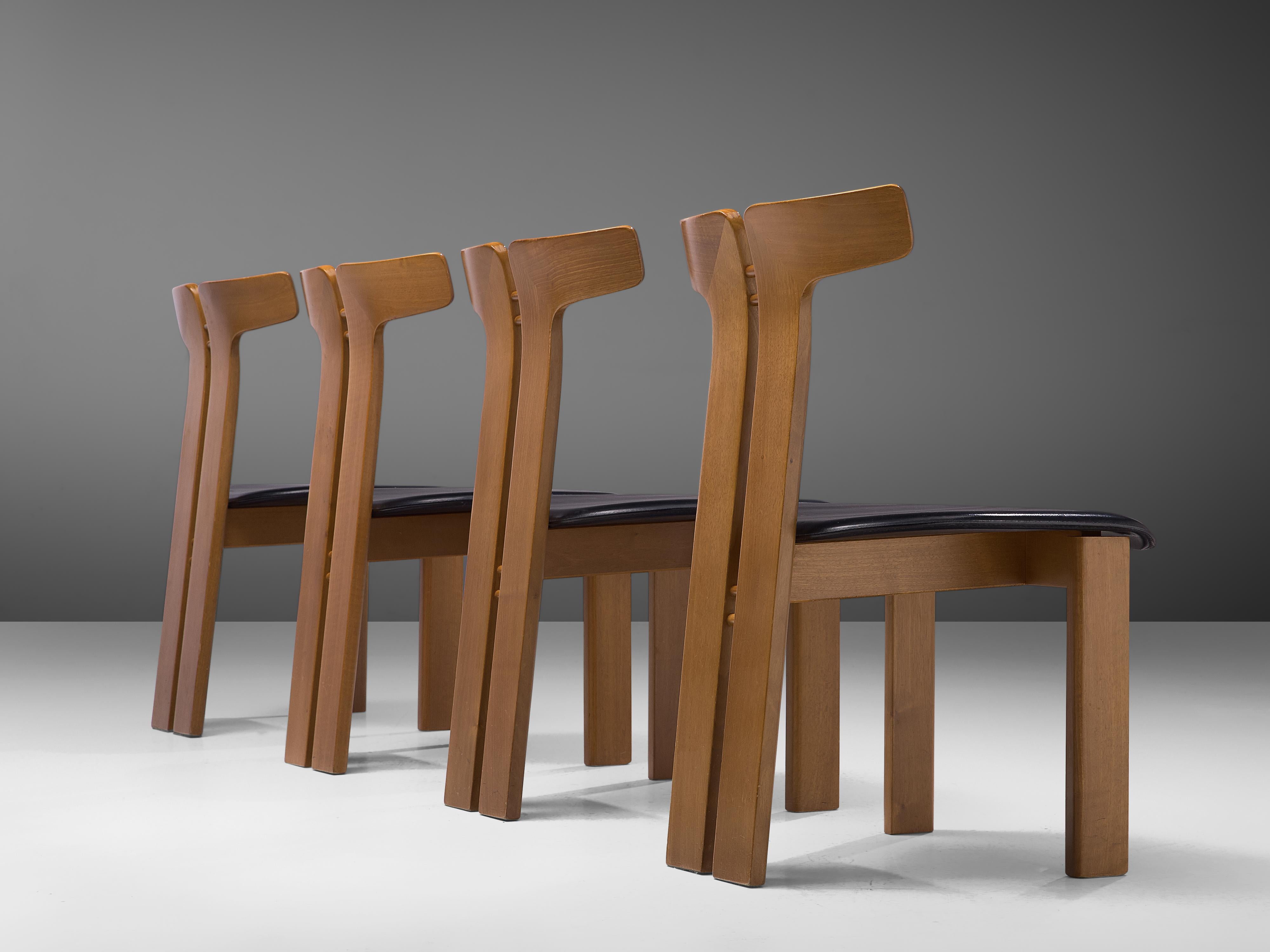 Pierre Cardin, set of four chairs, ash and leather, Italy, 1980s

This set of sculptural chairs is designed by Pierre Cardin. The curved back highlights the qualities of the wood and its shape in an unparalleled manner. These organic lines are