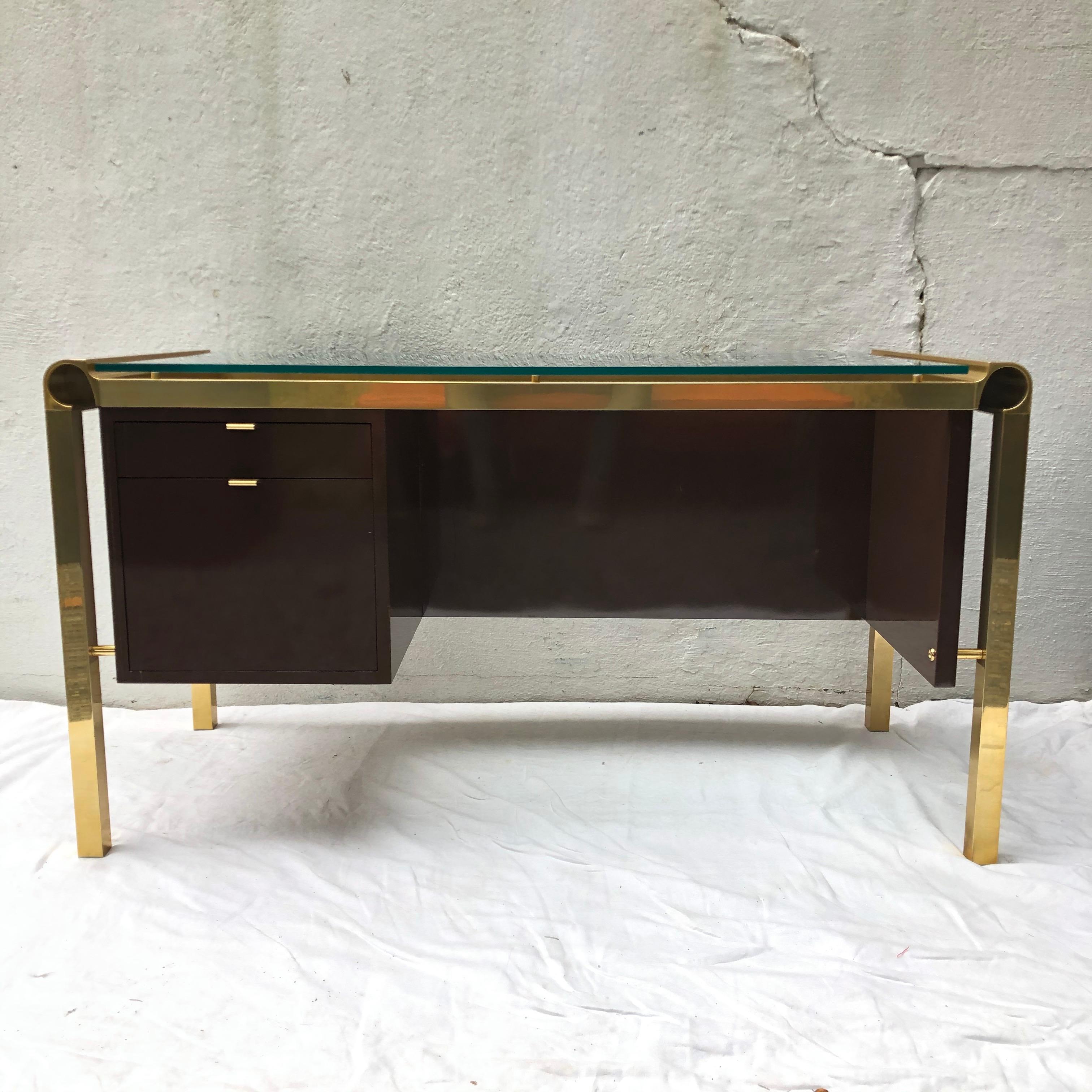 Brass and lacquer desk with glass top in the style of Pierre Cardin.
