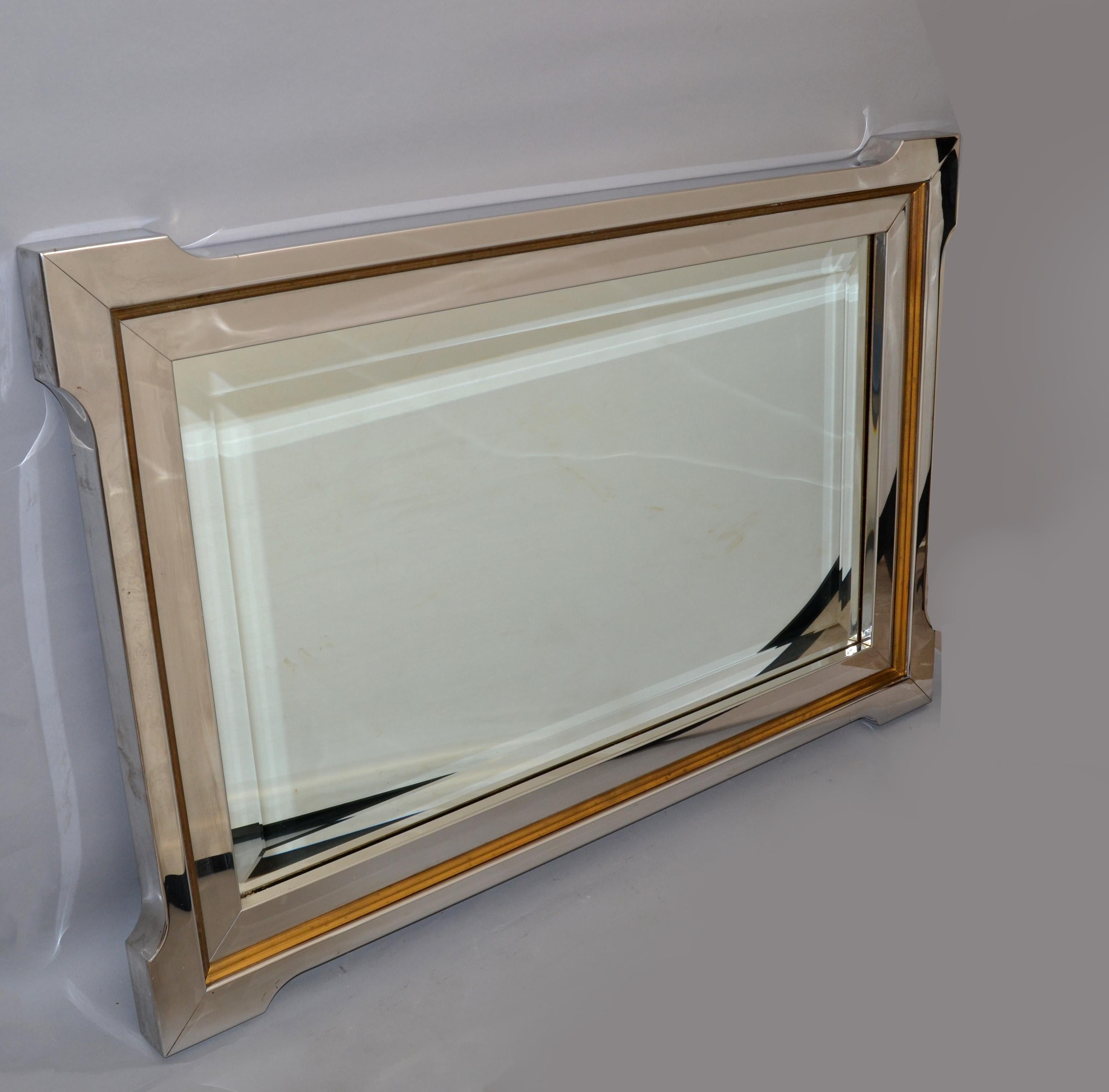 Pierre Cardin Style Mid-Century Modern Chrome and Brass rectangle beveled Wall Mirror with Wood Backwall. 
Picture Size: 21 x 36 inches.
Can be placed horizontally as well as vertically.