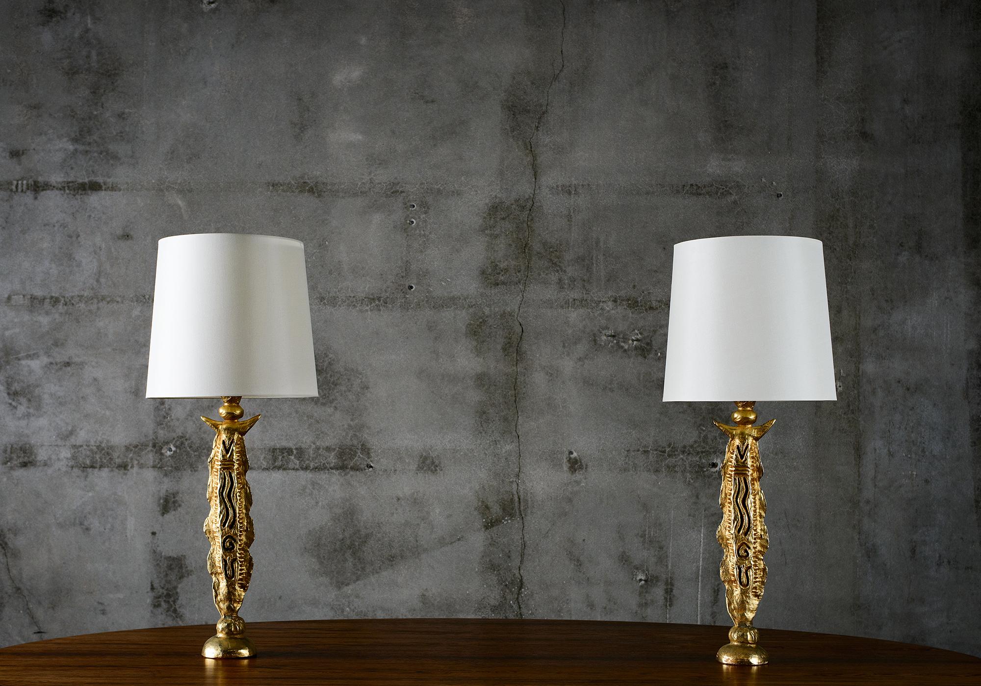 Pair of Pierre Casanove gilt table lamps with silk shades, marked.