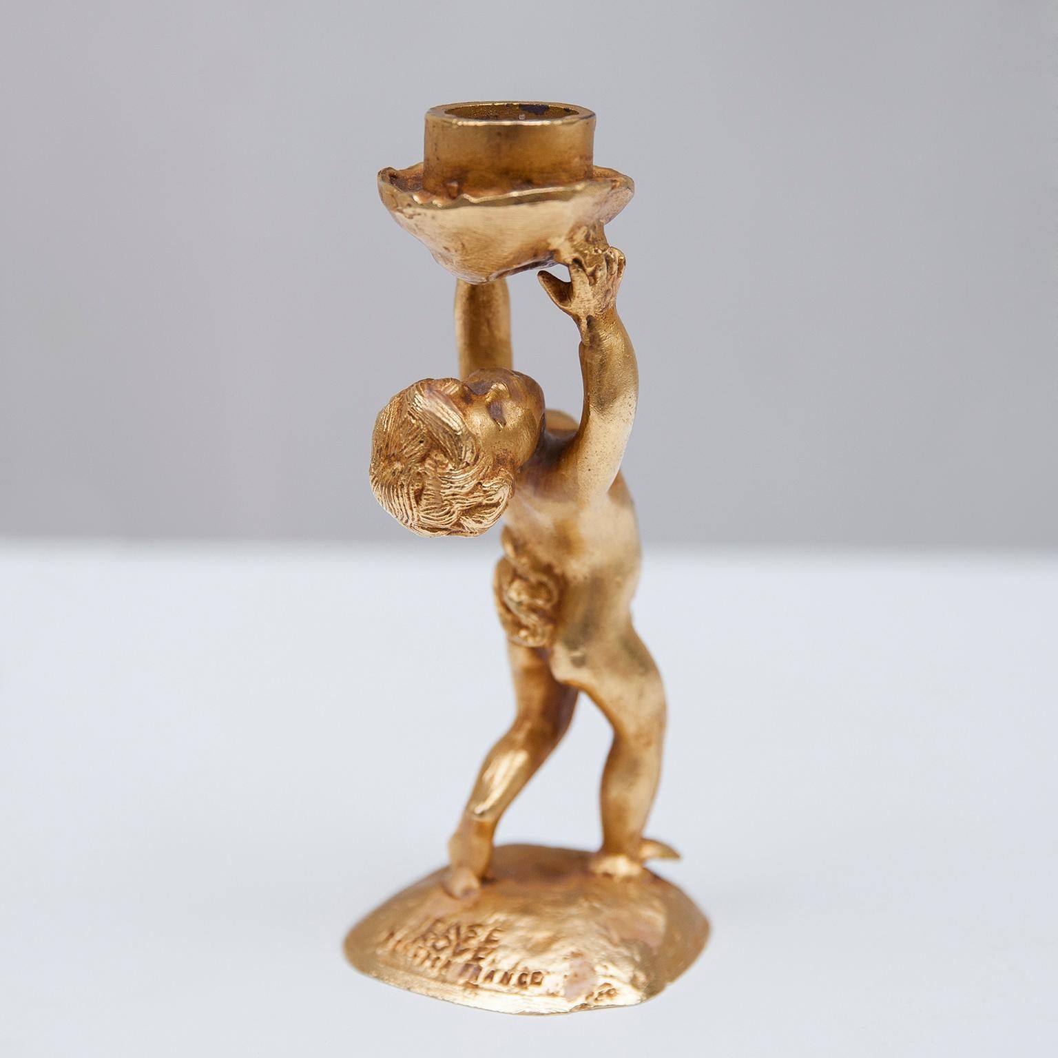 Extremely heavy gilt bronze candleholder by Pierre Casenove, highly collectible and quite rare and signed.

  