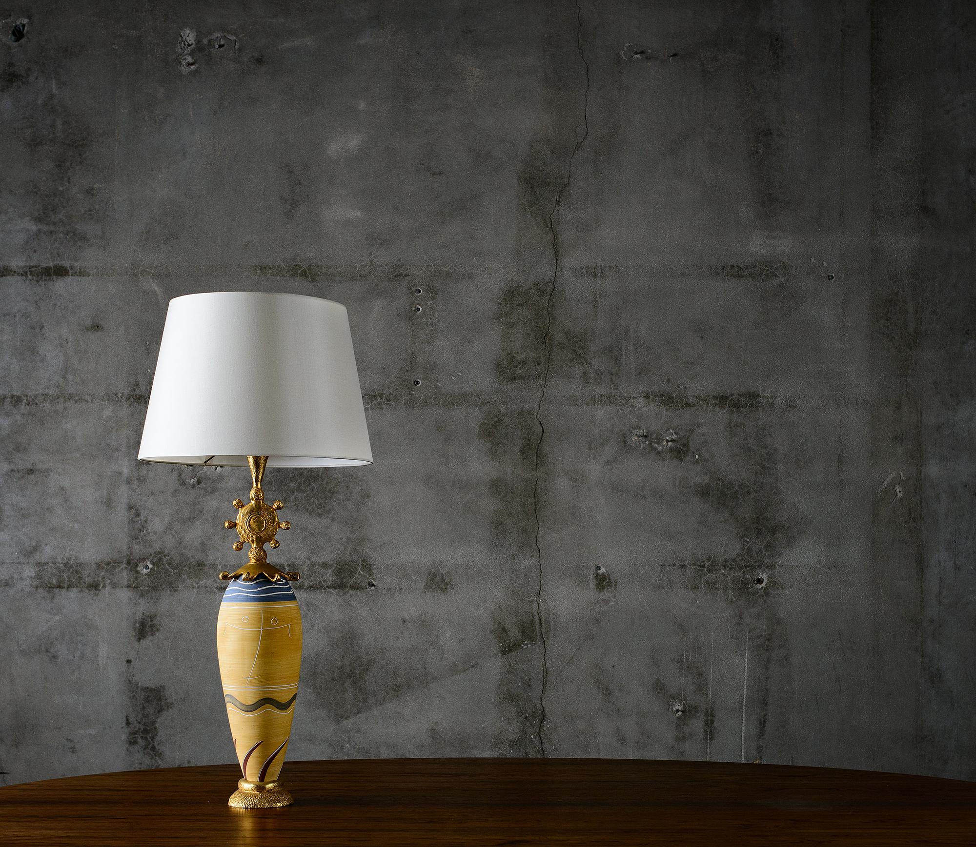 Pierre Casenove Fondica painted ceramic and gilt metal table lamp.