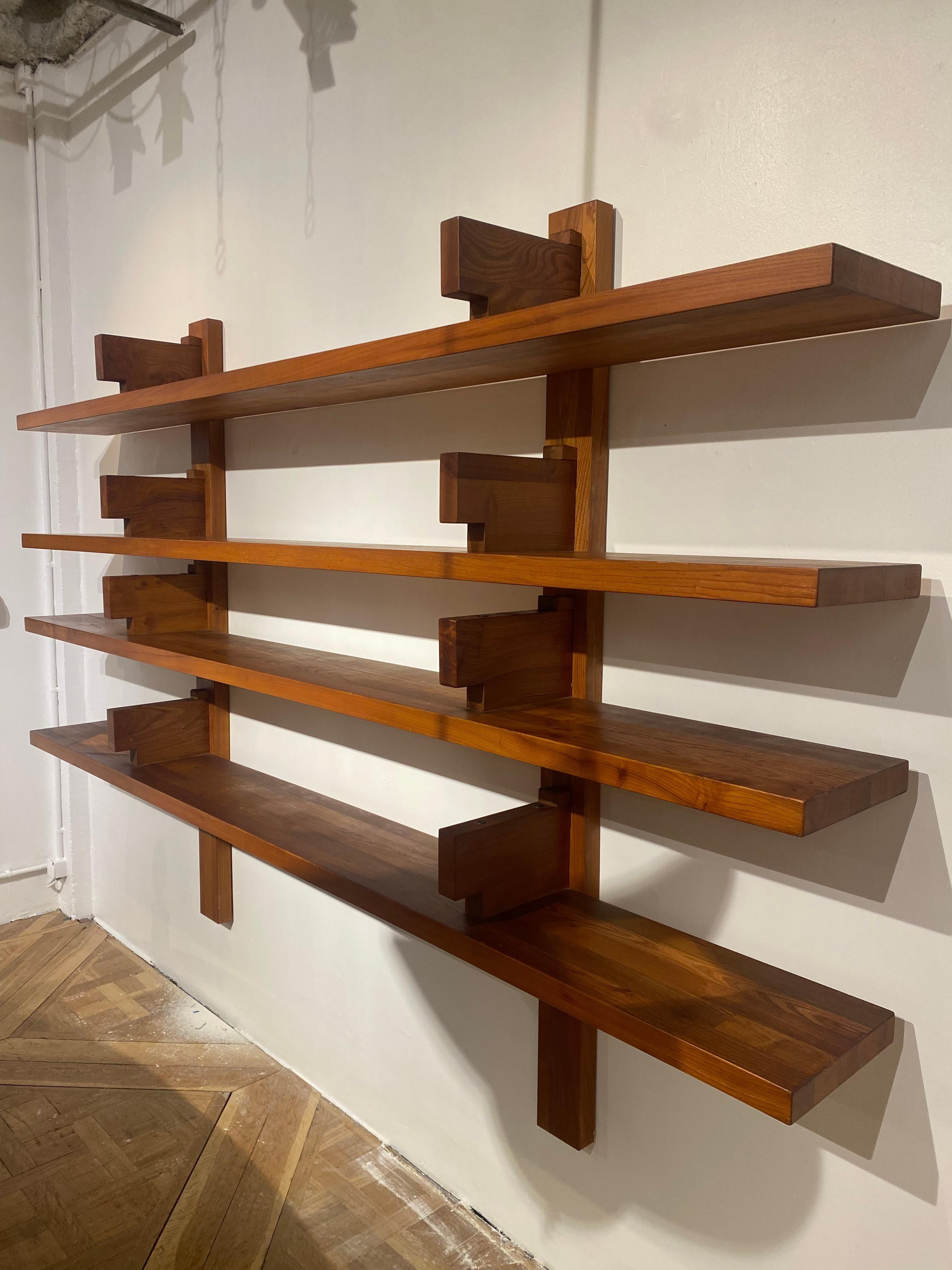 The largest shelf made by Pierre Chapo,
This model was bought in Pierre Chapo gallery in 1960s.
Wonderful elm wood with a very beautiful patina.
A rare pièce on the market and a real sculpture on the wall. Measures: 285cm.

 
 