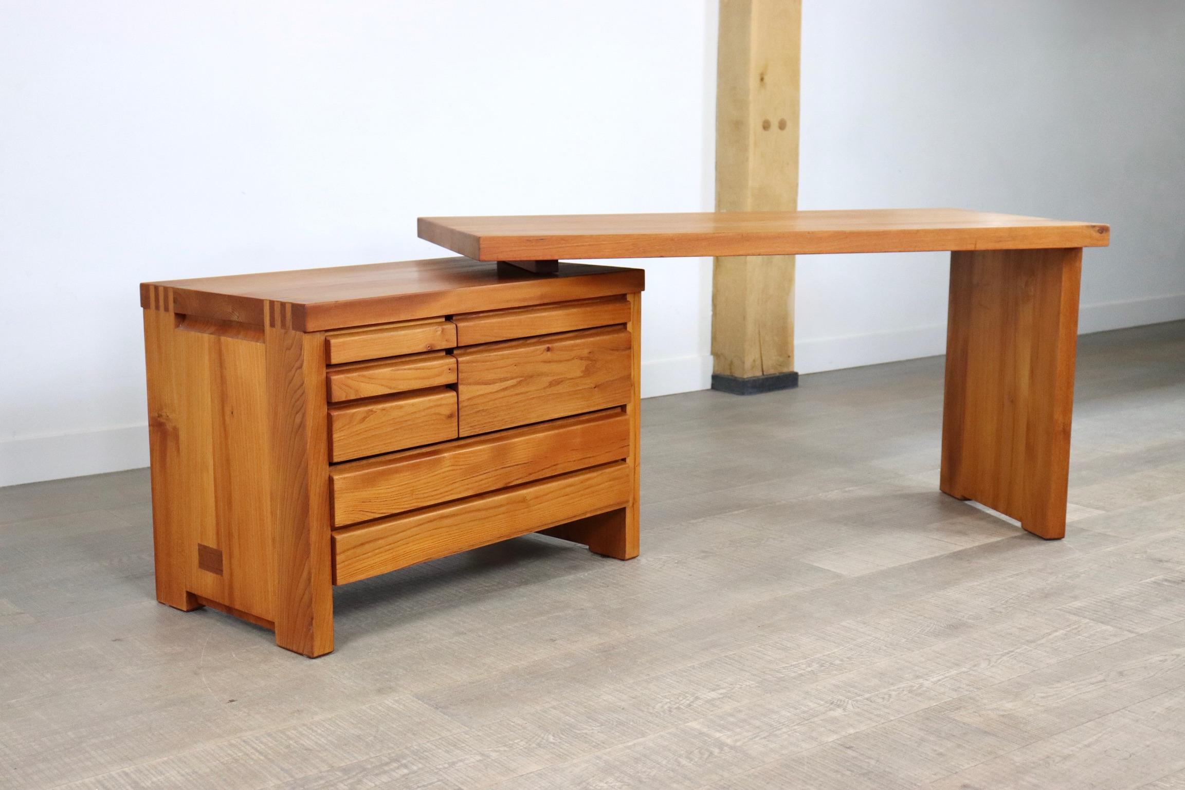 Stunning solid elmwood desk by the French designer Pierre Chapo. With characteristic wood-joints, which are Chapo's trademark this desk can be admired from every angle. The B19 desk is a desk that can be freestanding, as the drawers can be placed to