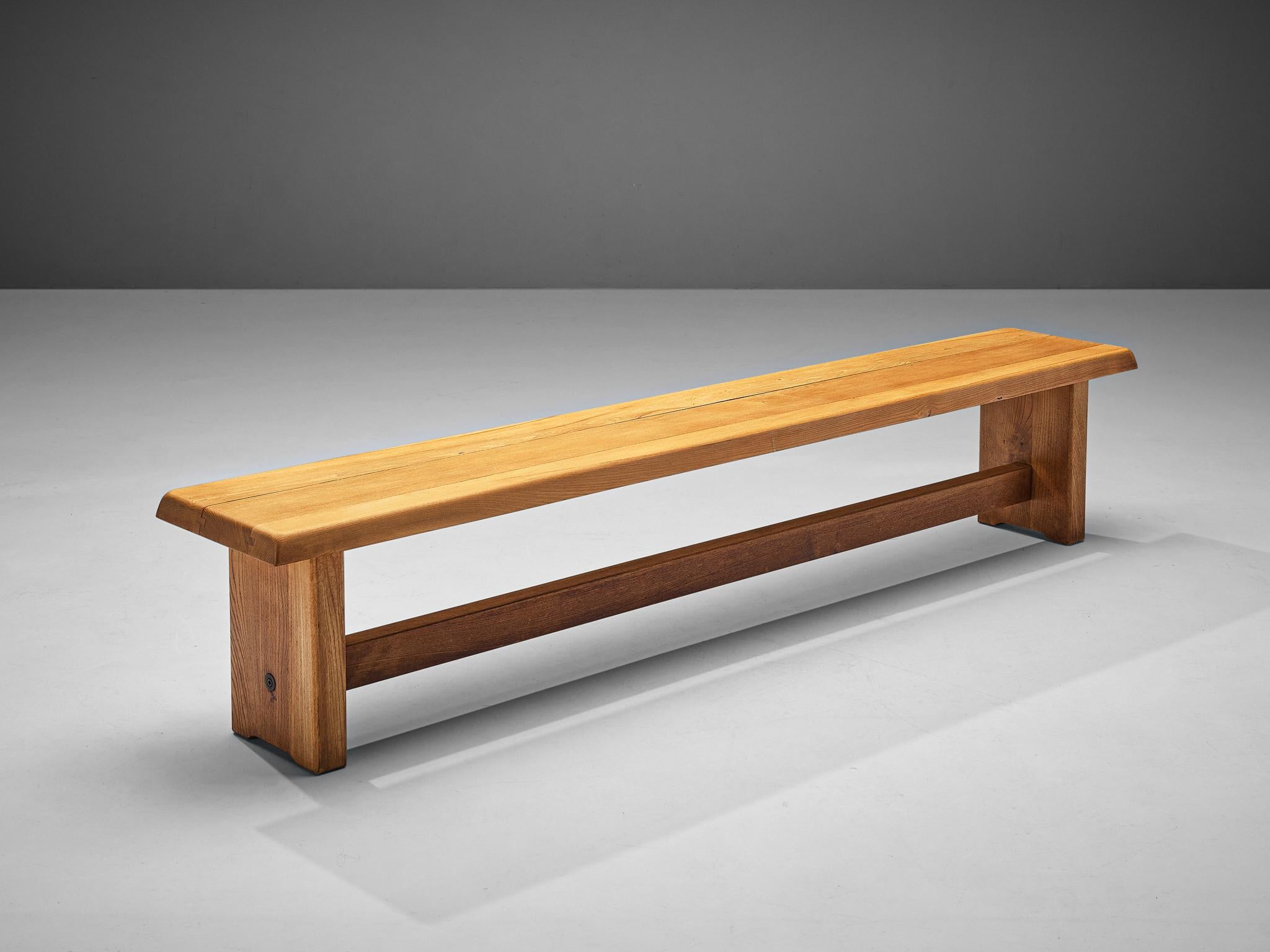 Pierre Chapo, bench model 'S14D', solid elm, France, 1950s. 

This elm bench is designed by the French designer Pierre Chapo. The rectangular top features sloping edges, rests on a two-legged base with a connecting horizontal beam. The strong and