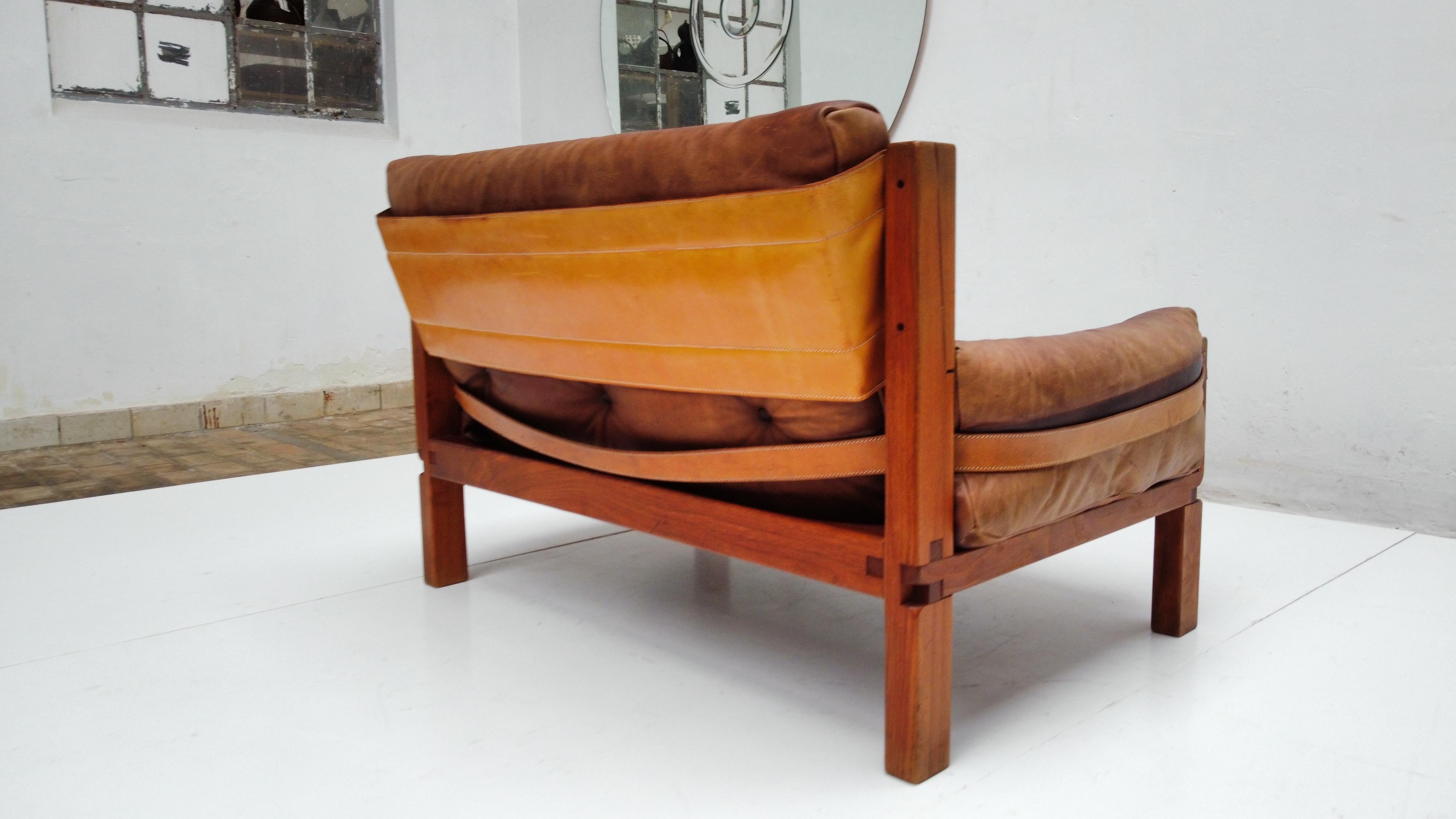 S18 Loveseat by Pierre Chapo circa 1970

New webbing 
Original leather with a beautiful old user patina that has been cleaned and polished 
The cushion interiors have been filled with a new Latex and Dacron filling fiber 

Lovely authentic