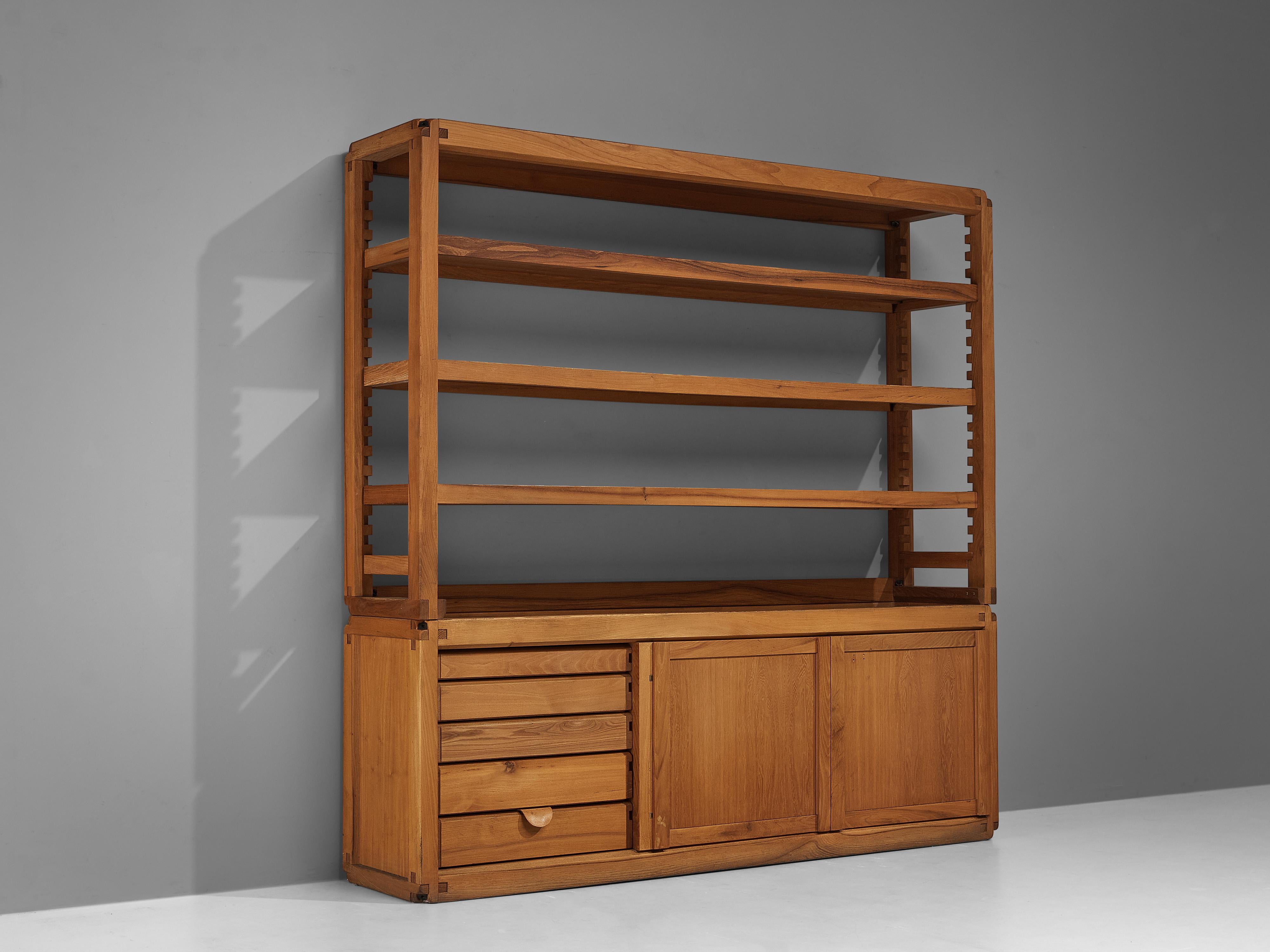 Pierre Chapo, bookcase model 'B10', elm, France, 1960s

This is a versatile shelf model 'B10' designed by Pierre Chapo. The shelving system was created in the 1960s. This robust and solid bookcase consists of a closed compartment with drawers and