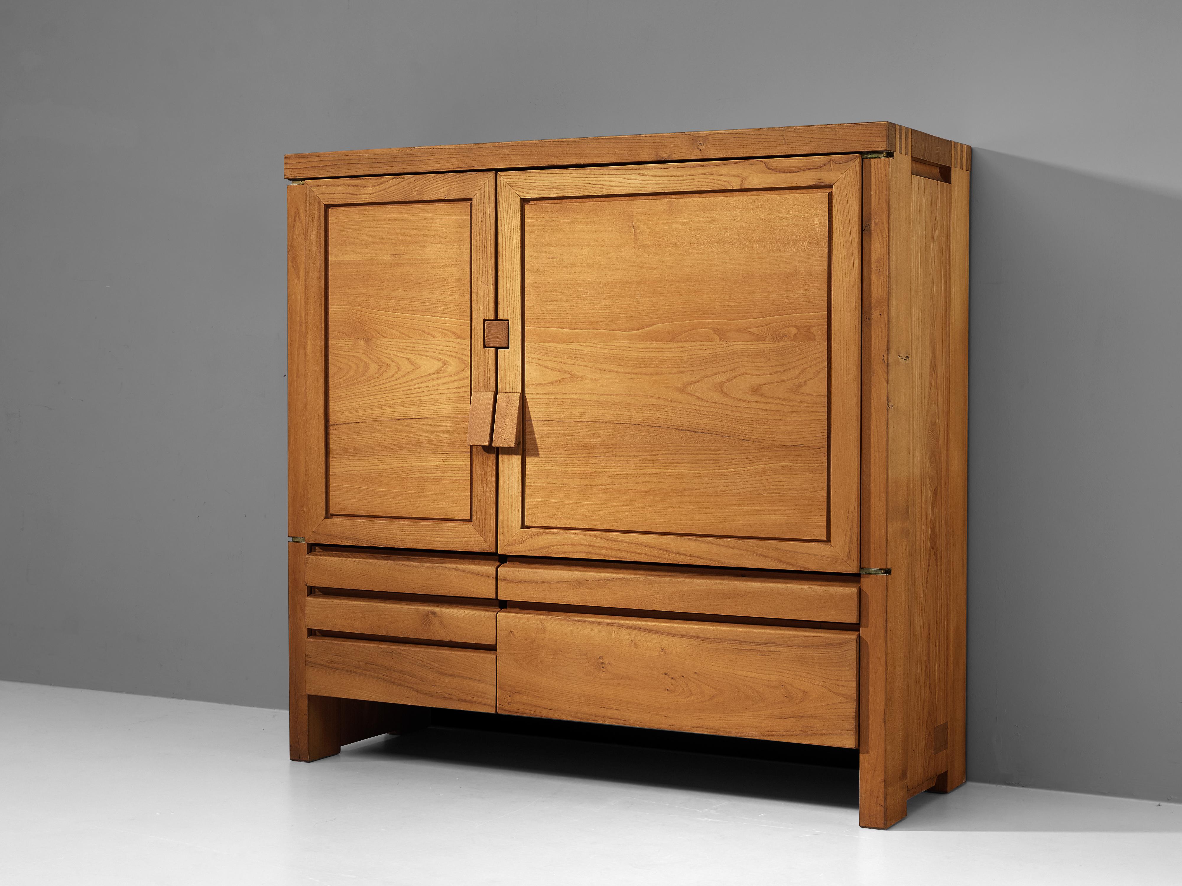 Pierre Chapo, cabinet model 'R18', solid elm, France, late 1960s

This exquisitely crafted cabinet combines a simplified yet complex design combined with nifty, solid construction details that characterize Chapo's work. Two doors of different