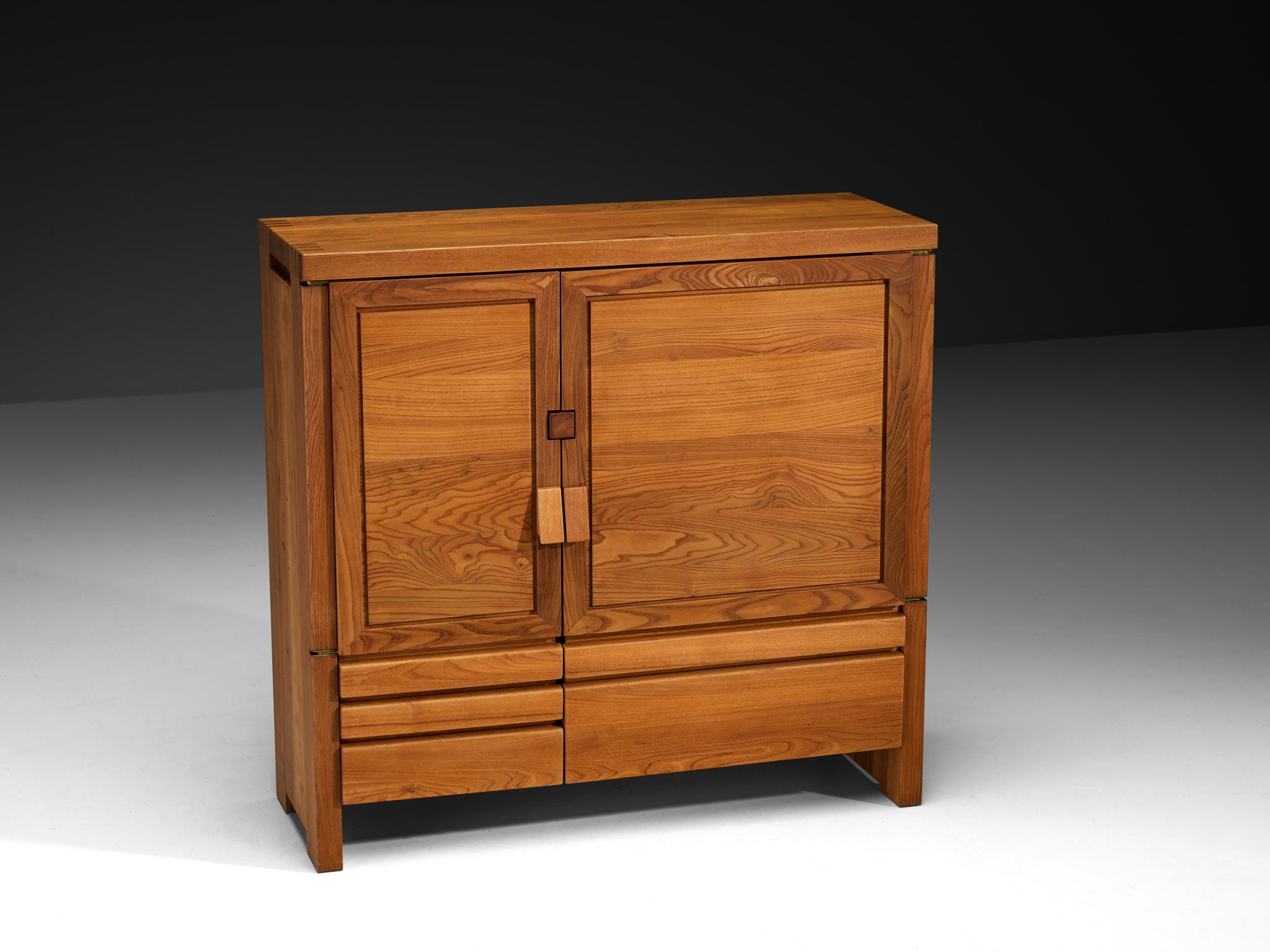 Pierre Chapo, cabinet model 'R18', solid elm, France, 1960s

This exquisitely crafted 'R18' cabinet combines a simplified yet complex design combined with nifty, solid construction details that characterize Chapo's work. Two doors of different sizes