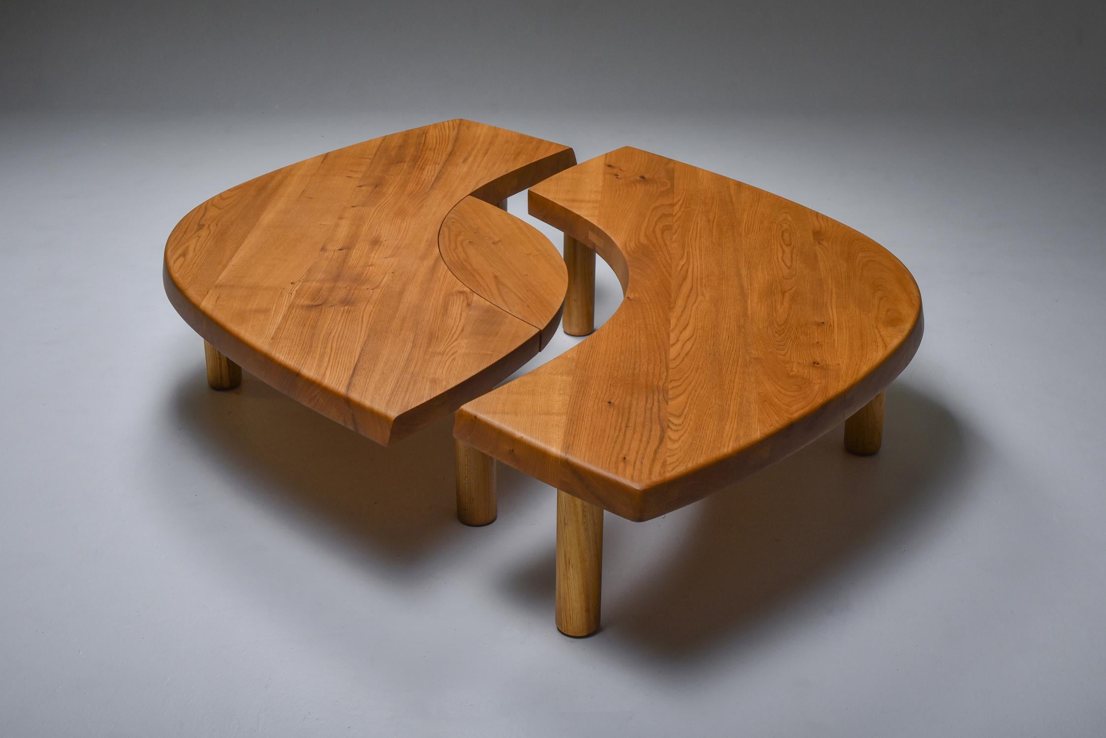 Pierre Chapo, coffee table, model T22C, elm, France, circa 1972

This early edition eye-shaped cocktail table by the French designer Pierre Chapo (1927-1987) is made out of elm.
 It consists out of two arch-shaped tables and one oval middle. The