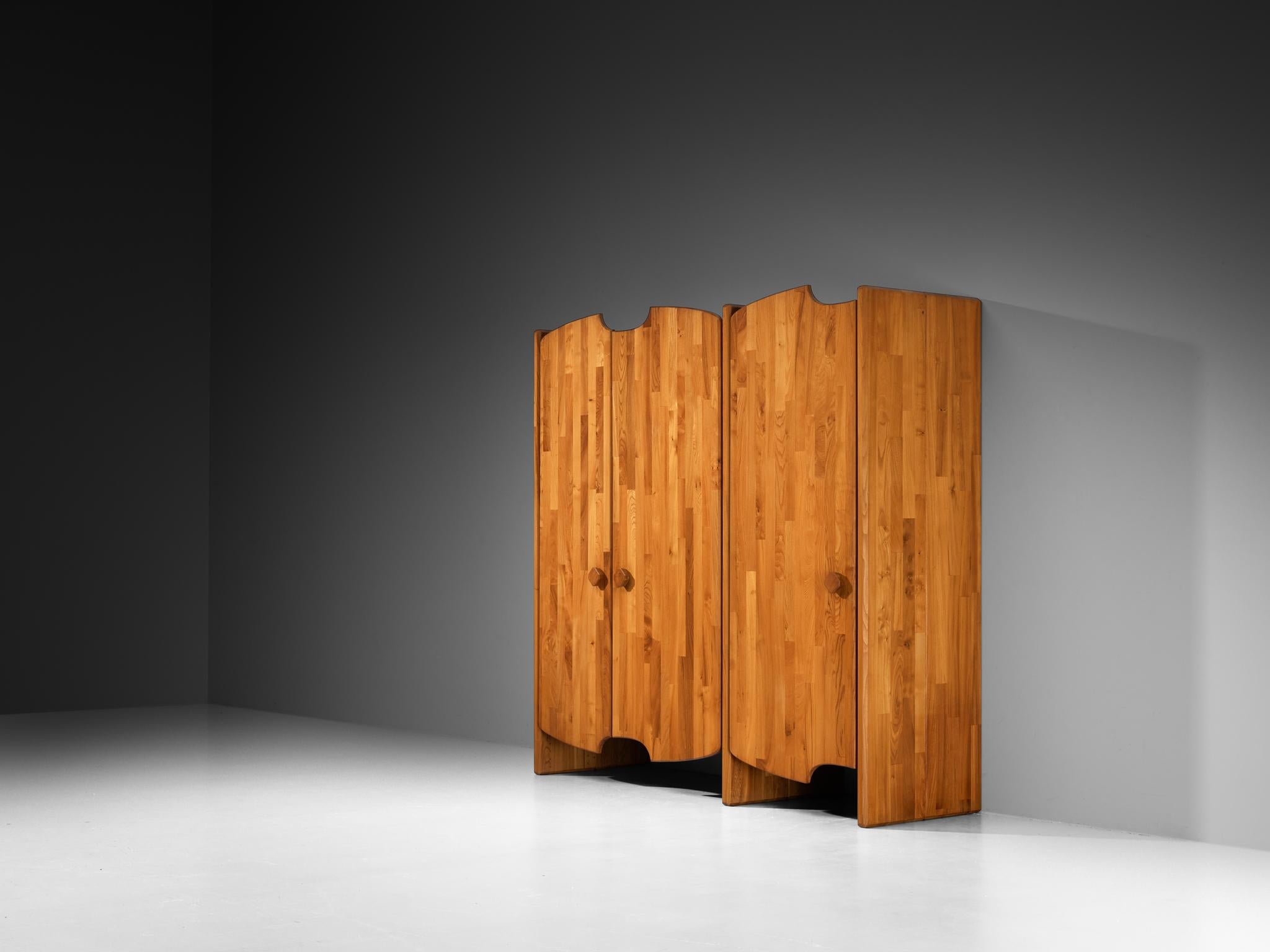 Pierre Chapo, wardrobe from the series 'Chacc', elm, brass, France, 1979-1989

Special highboard designed by Pierre Chapo for a private client. This piece easily catches the eye of the viewer with its rhythmic, asymmetrical doors. The three doors