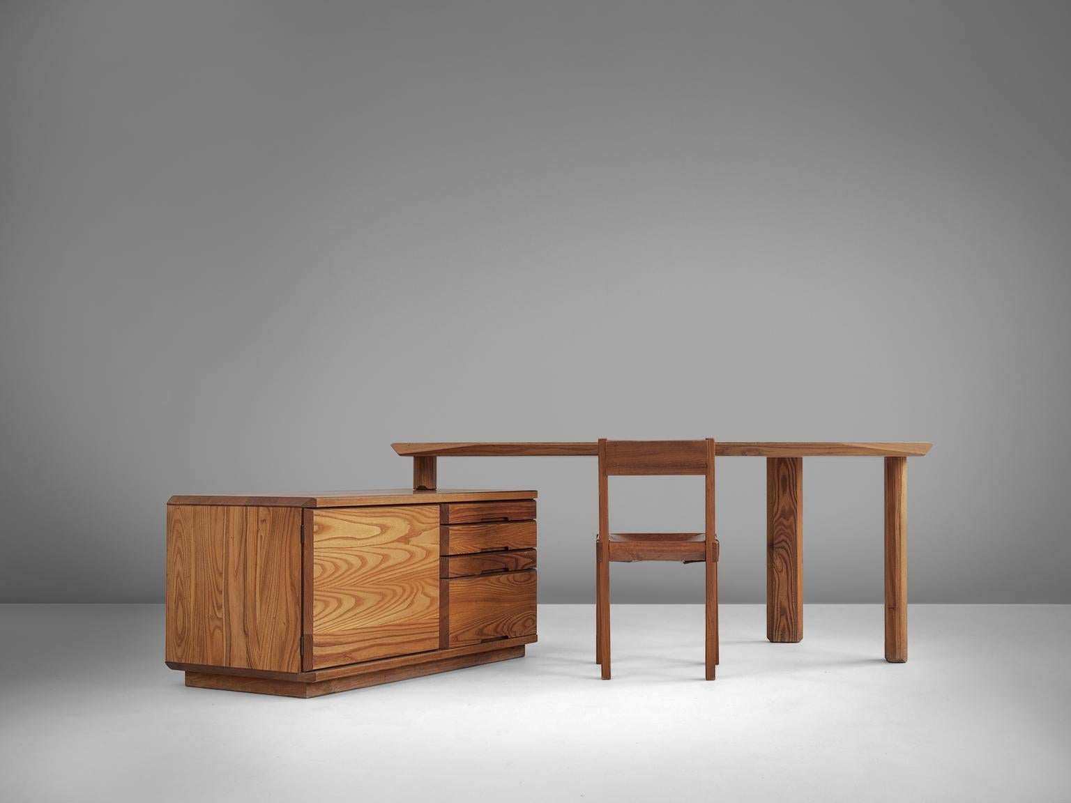 Pierre Chapo, adjustable desk B40, elm, France, 1960s.

Characteristic desk by French designer and carpenter Pierre Chapo. Eye-catching detail is the beautiful and expressive grain of the elmwood, visible on the entire item. Stunning polygonal