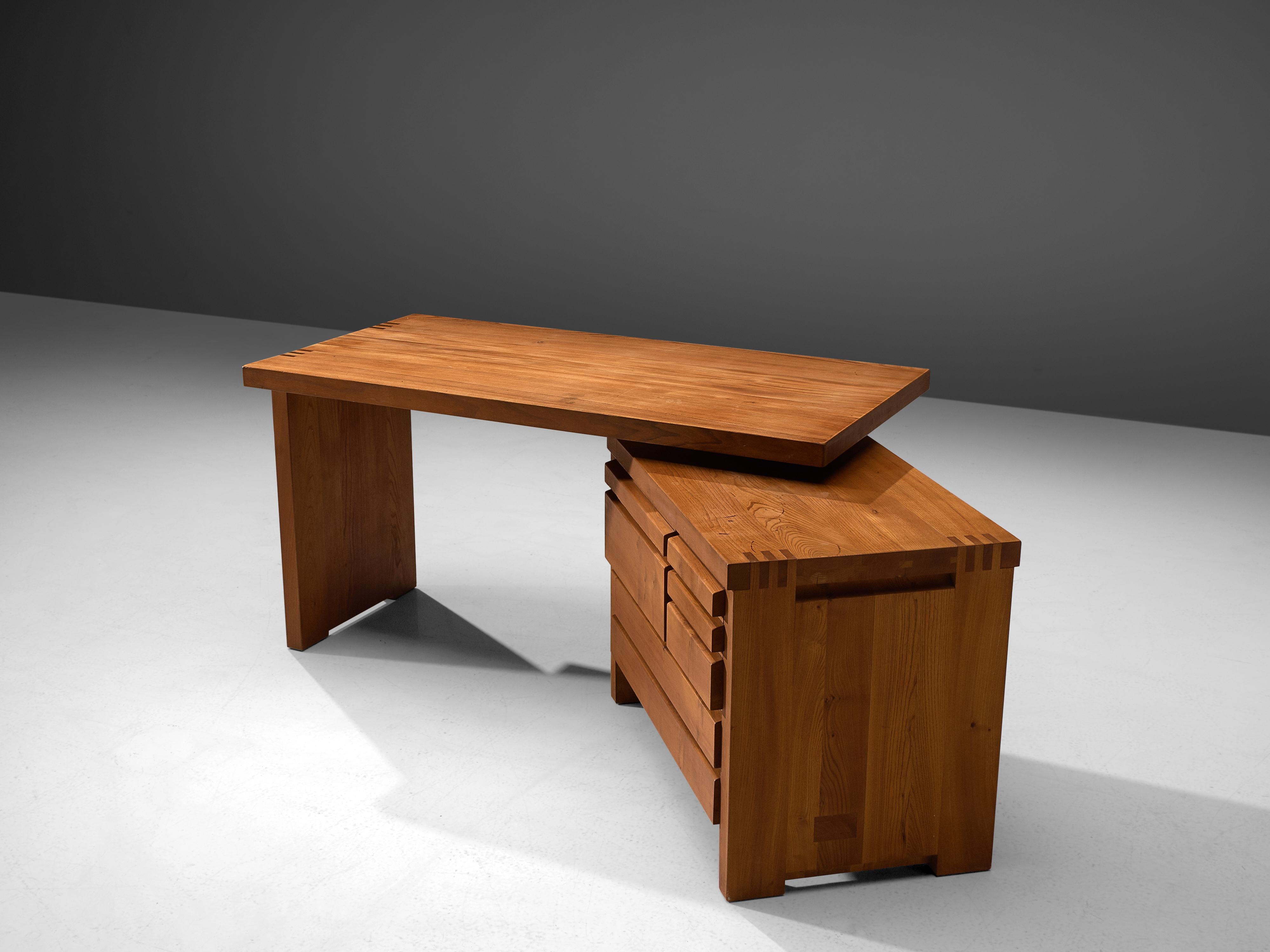 Pierre Chapo, desk model B19, elm, France, 1960s.

Executive desk in elmwood. The simplicity of this design is it's strength. The quality of the elmwood structure is sublime, it's kept together with beautifully made wooden joints. The storage part