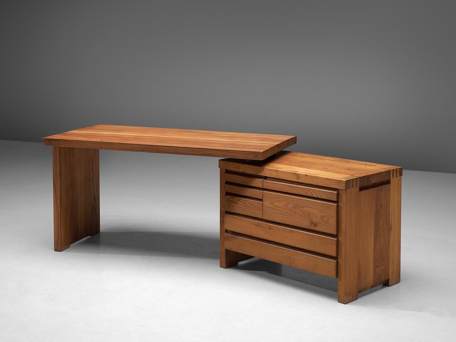 Pierre Chapo, desk model B19, elm, France, 1960s.

Executive desk in elmwood. The simplicity of this design is it's strength. The quality of the elmwood structure is sublime, it's kept together with beautifully made wooden joints. The storage part