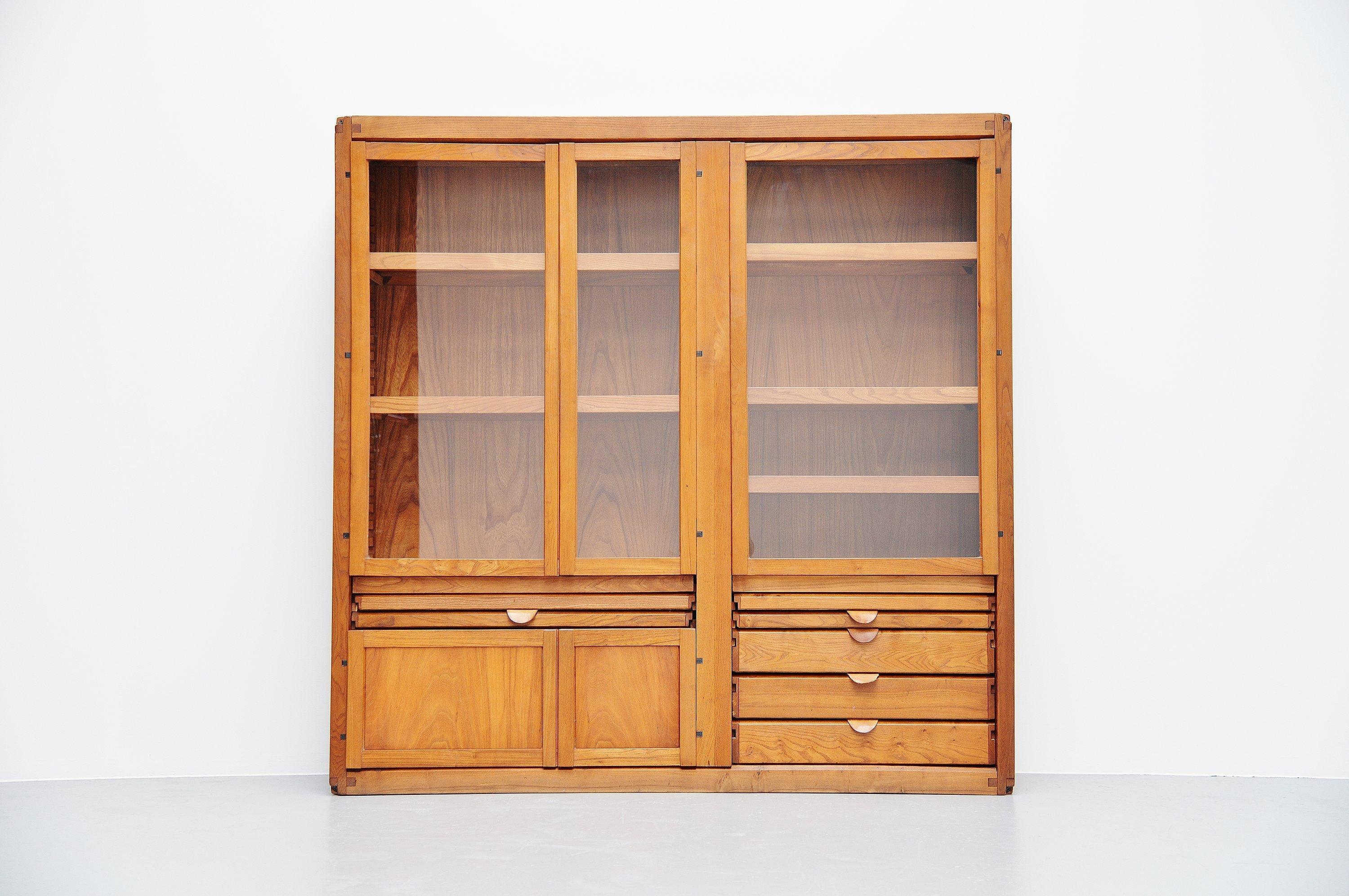This is a masterpiece of a display cabinet from the B10 modular series designed by Pierre Chapo and manufactured in his own atelier in France, 1962. This cabinet is from the modular B10 system, so every piece could be designed to the clients wishes.