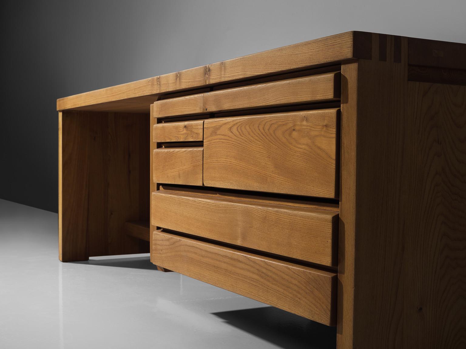 Pierre Chapo, dressing table R05A, elm, 1960s

This exquisitely crafted table with drawers combines a simplified yet complex design combined with nifty, solid construction details that characterize Chapo's work. The joints on the corner of this