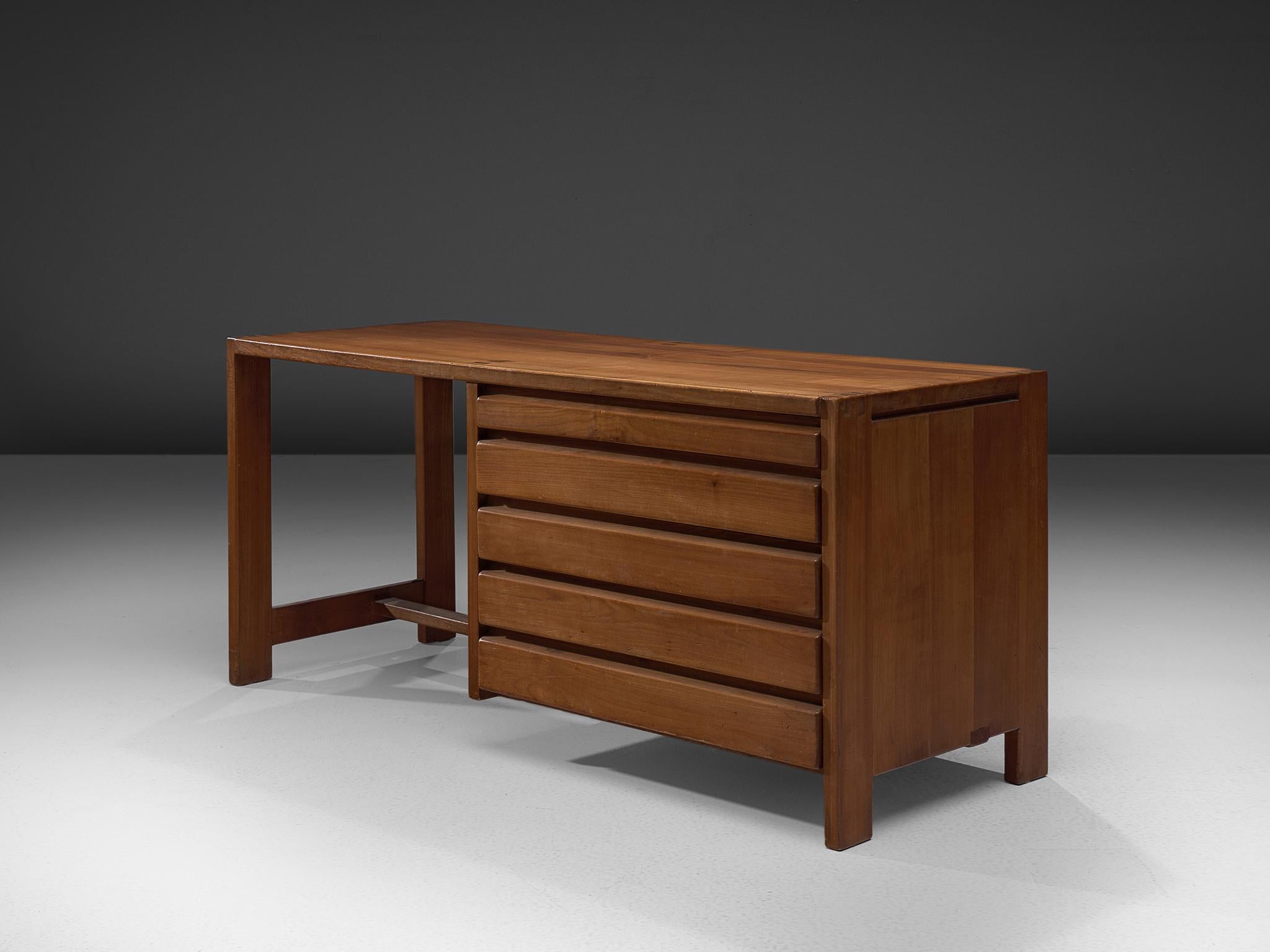 Pierre Chapo, dressing table model 'R05', elm, circa 1960

This design is an early edition, created according to the original craft methodology of Pierre Chapo. This exquisitely crafted table with drawers combines a simplified yet complex design