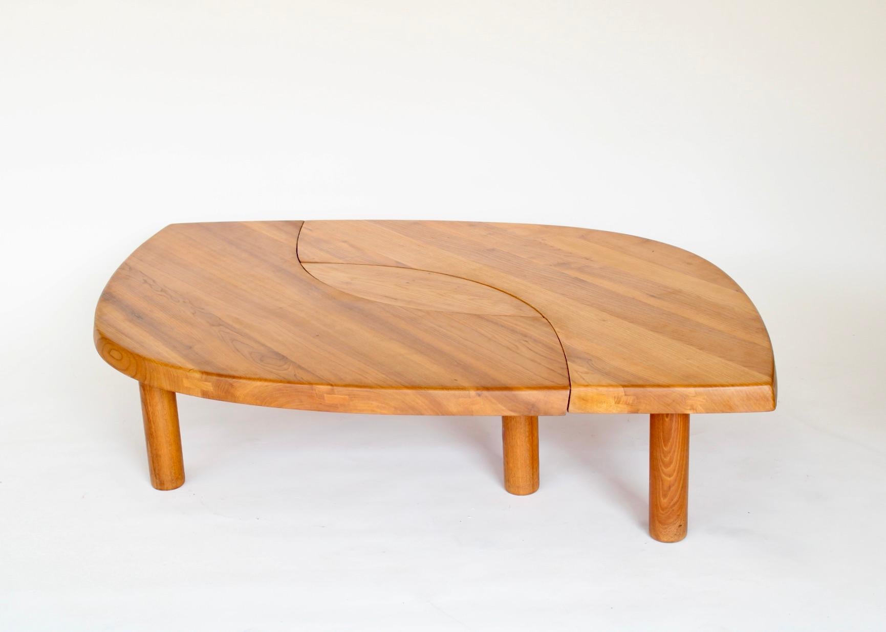 Pierre Chapo coffee table in elm wood, Model T22 C circa 1972.
This is a fine vintage example, not the current production. 
Excellent condition. Small eye piece stamped with the number 4 on each strut. 
Pierre Chapo was born in a family of