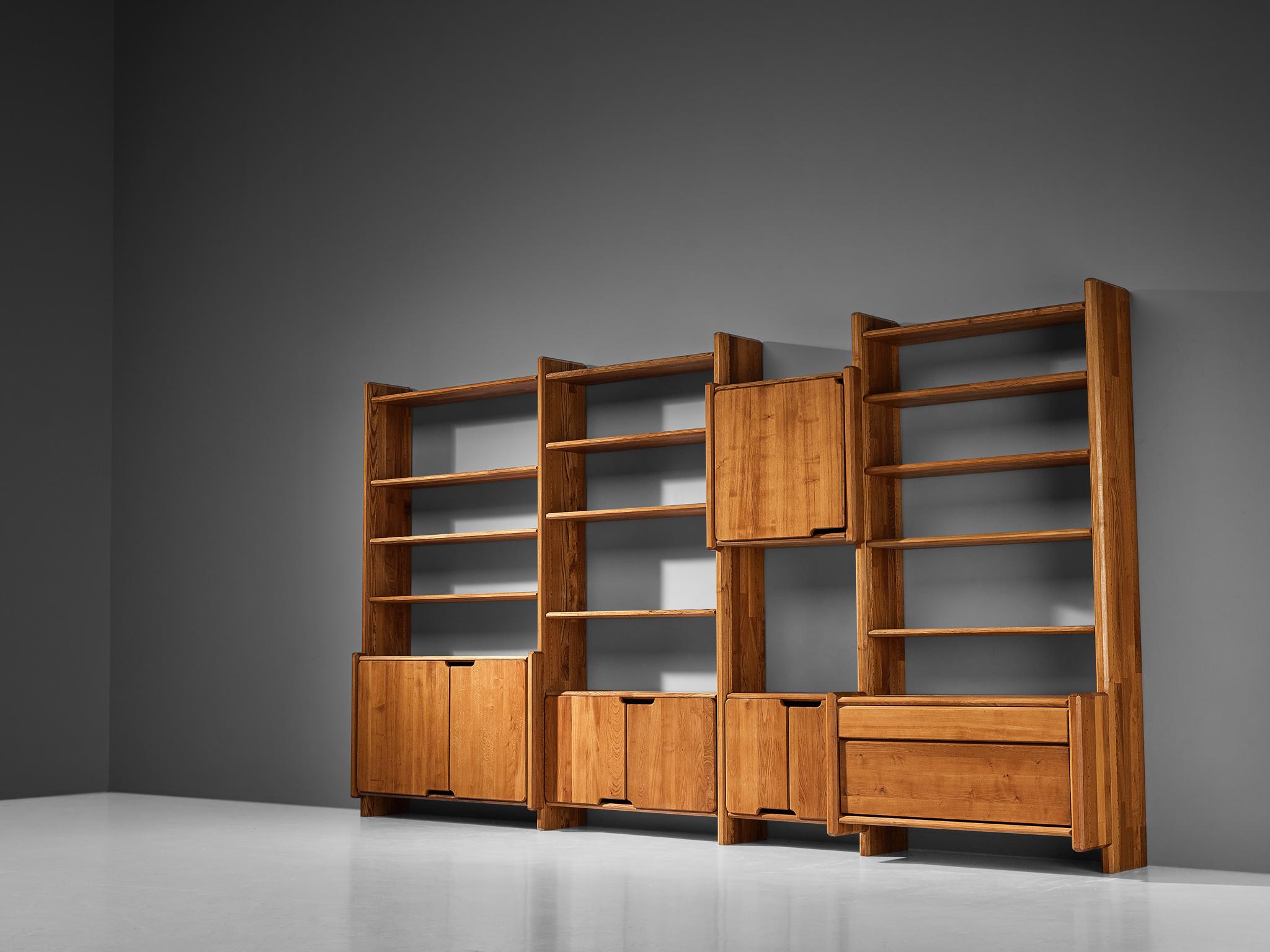 Pierre Chapo, modular bookcase, model 'GO', elm, France, 1983.

This design is an early edition, created according to the original craft methodology of Pierre Chapo. This bookcase is realized according to Chapo's fundamental principles: material,