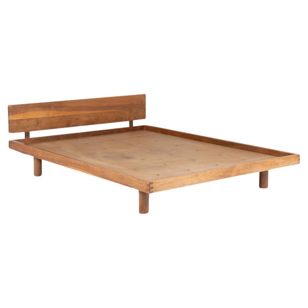 Pierre Chapo. “Godot” model blond oak bed. 1960s. For Sale