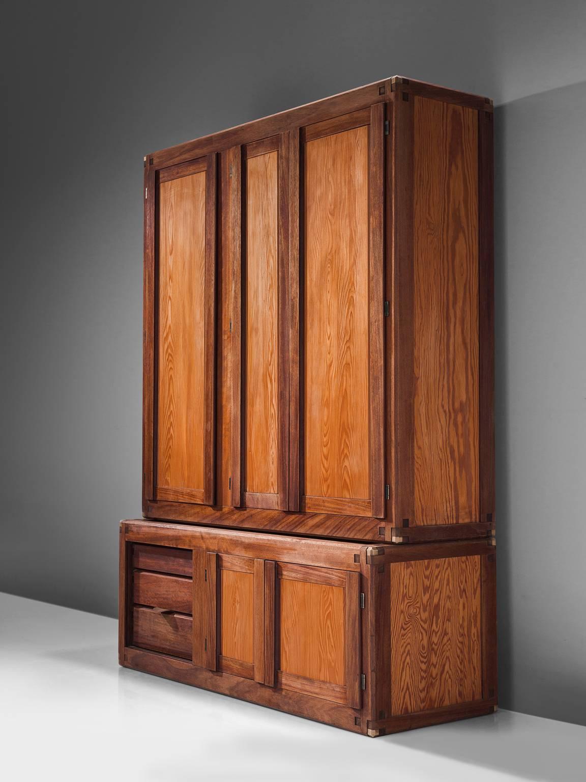 Pierre Chapo, cabinet B10, solid elm, France, 1960s. 

This bookcase or high cabinet is designed by the French designer Pierre Chapo. It is a piece of furniture that is modular and therefore could be designed according to the clients own wishes. It