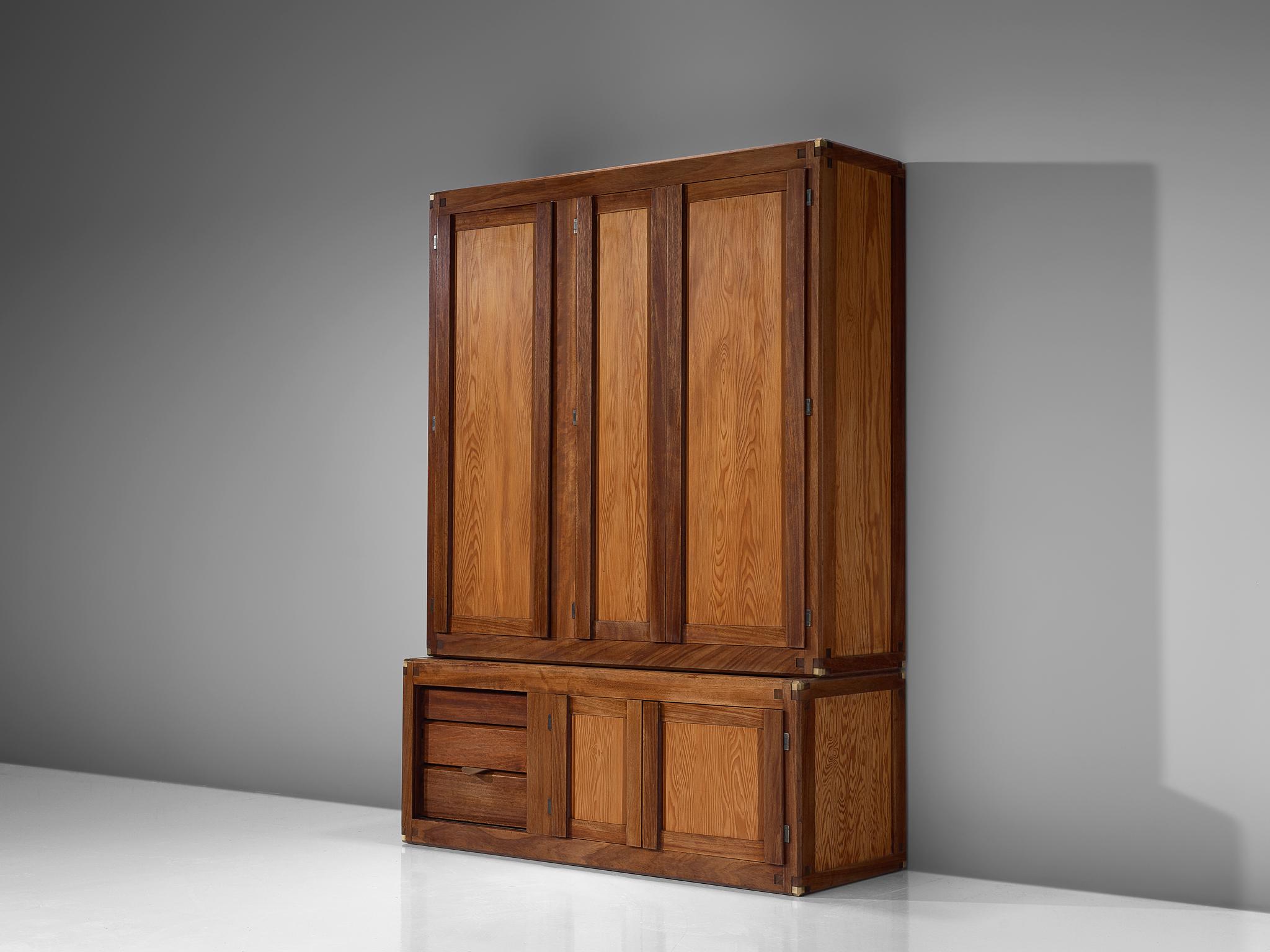 Pierre Chapo, cabinet B10, solid elm, France, 1960s. 

This bookcase or high cabinet is designed by the French designer Pierre Chapo. It is a piece of furniture that is modular and therefore could be designed according to the clients own wishes.
