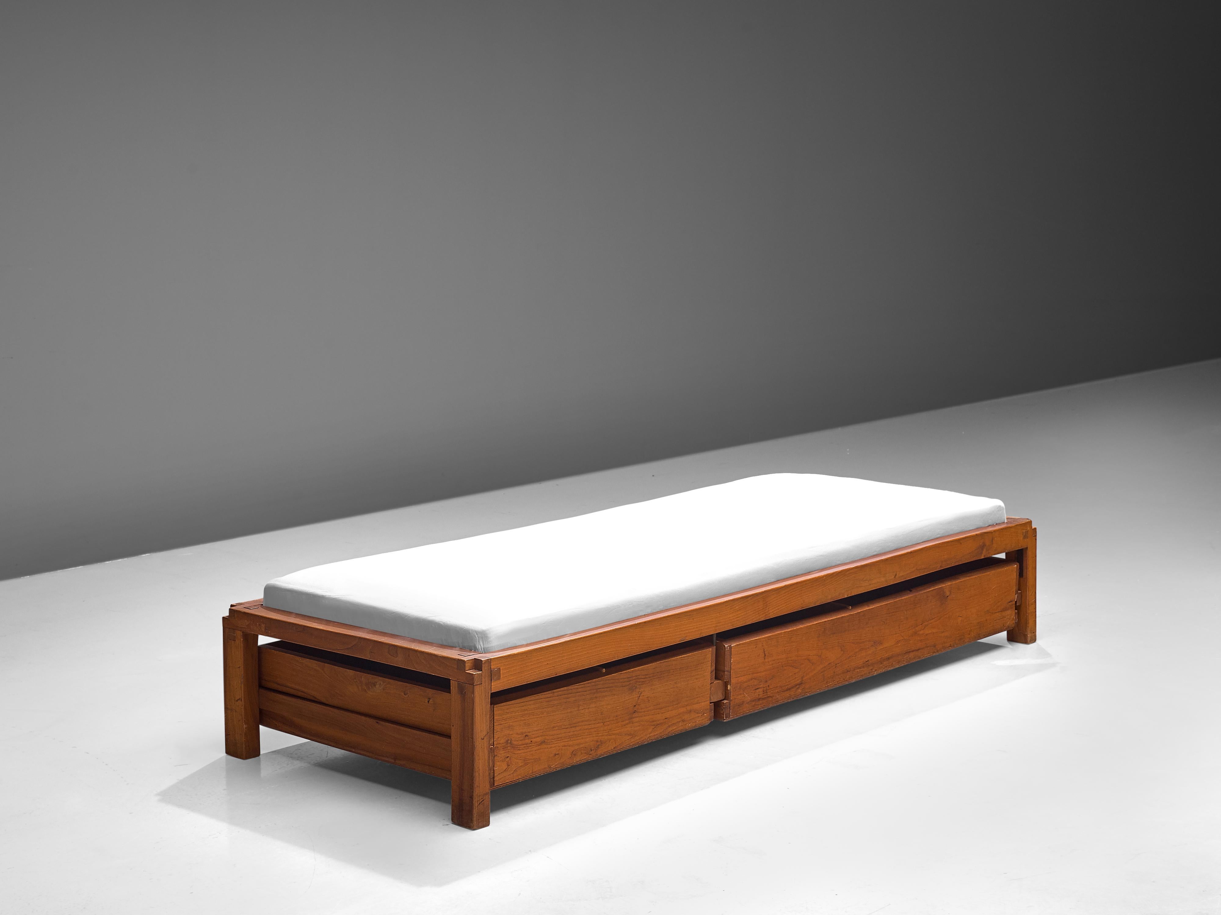 Pierre Chapo, single bed model L03, solid elm, France, 1965

Excellent designed single bed with the characteristic wood connections of Pierre Chapo. The L03 is a (day)bed whose minimal design was a rarity at that time - all superfluous elements were