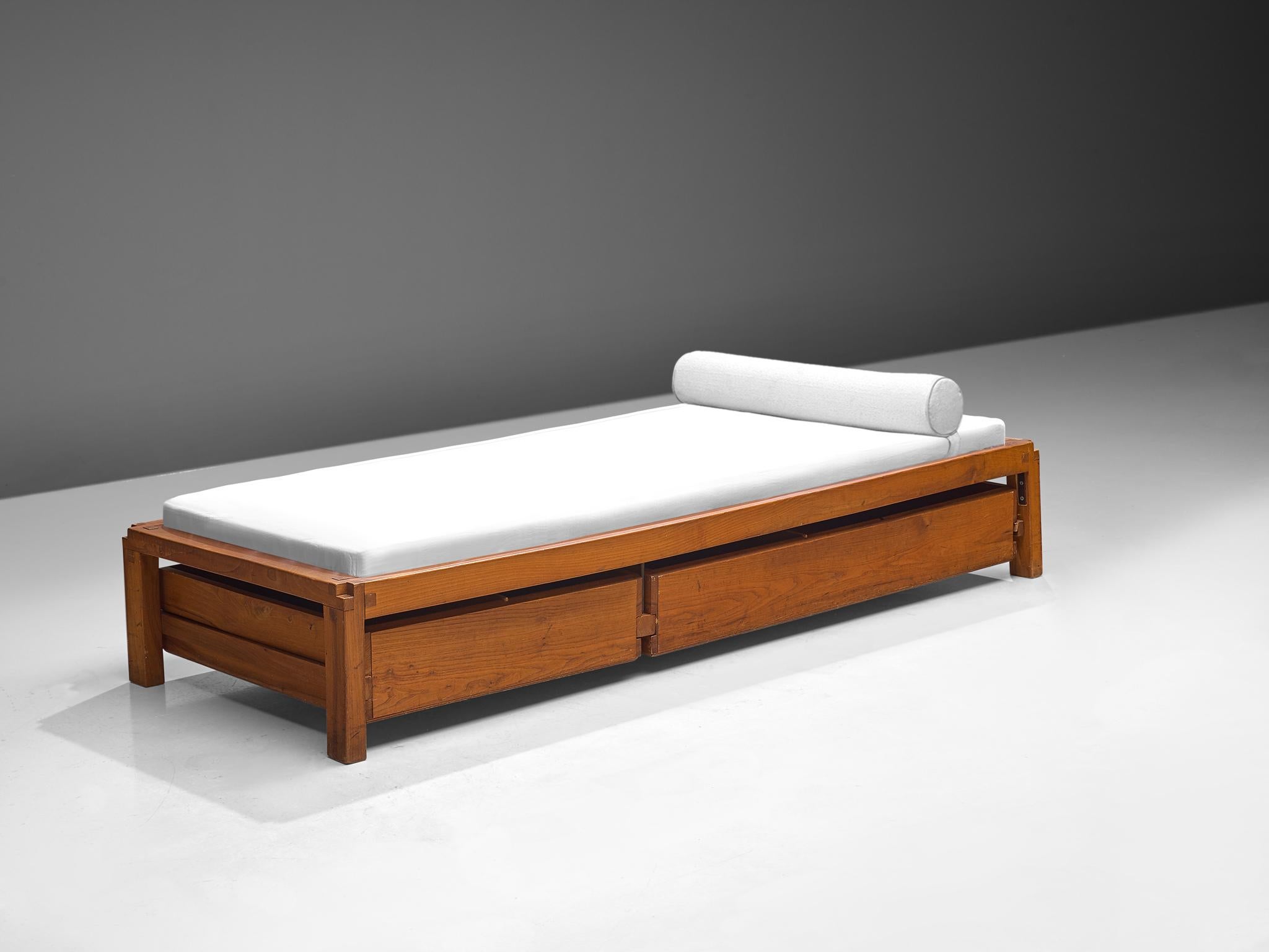 Pierre Chapo, single bed model L03, solid elm, France, 1965

Excellent designed single bed with the characteristic wood connections of Pierre Chapo. The L03 is a (day)bed whose minimal design was a rarity at that time - all superfluous elements