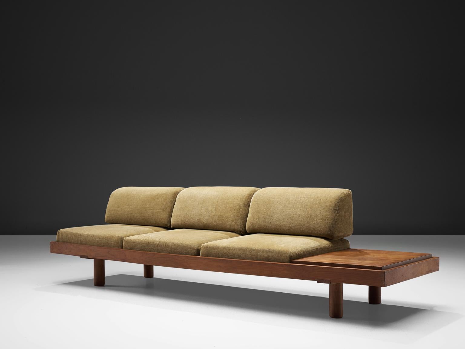 Pierre Chapo, bench L 09 H, elm and beige to green fabric, France, design 1960s. 

The piece is a true classic by Chapo in the way it is proportioned. The thick, cylindrical legs combined with the top that holds an asymetrical aesthetic with a