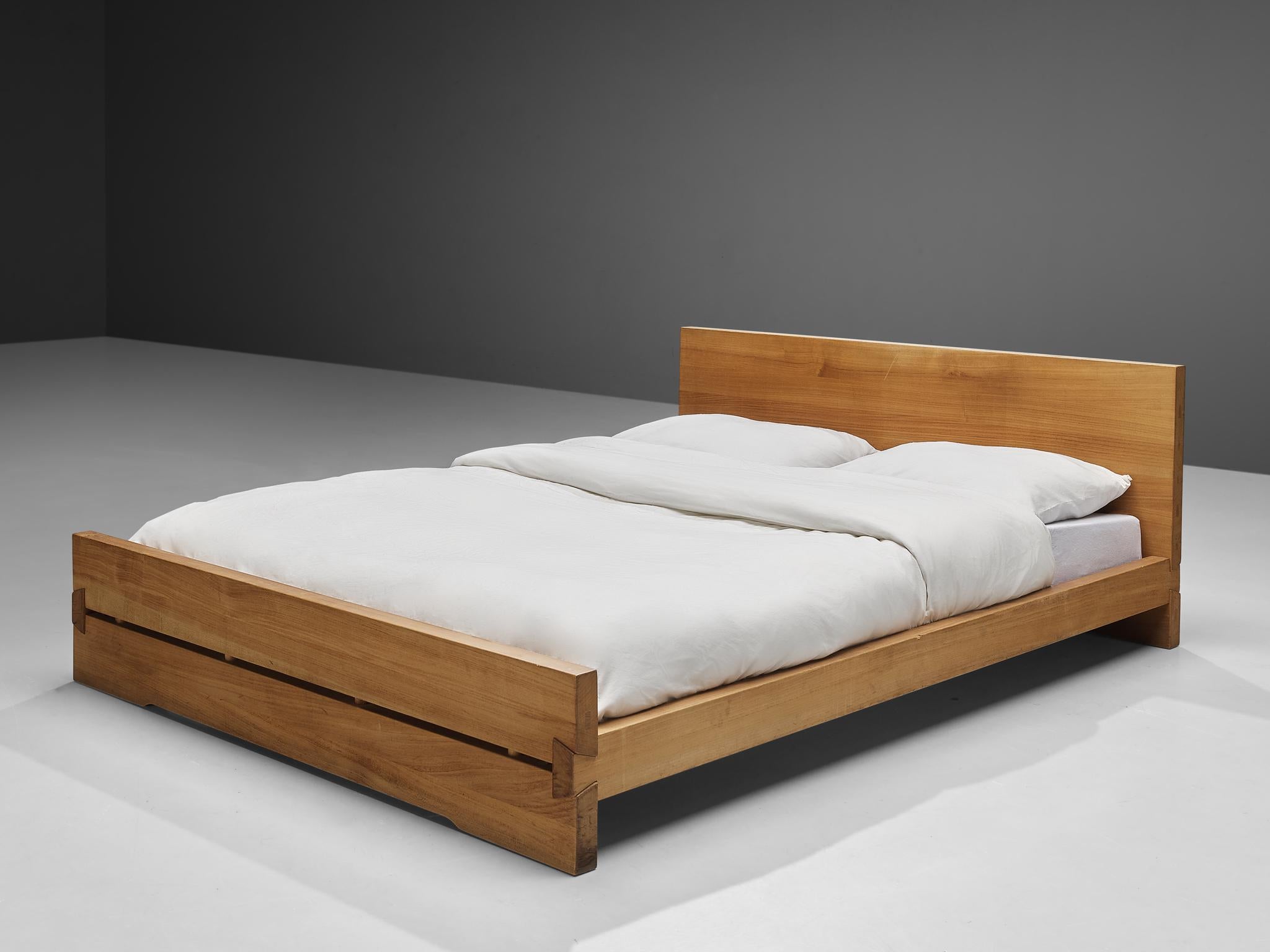 Pierre Chapo, bed 'Louis' model L02C, elm, France, 1960s

This bed is designed by Pierre Chapo in the 1960s. It features the handcrafted joints that the woodworker Chapo is known for. The bed holds a tall headboard and a lower foot end. They are