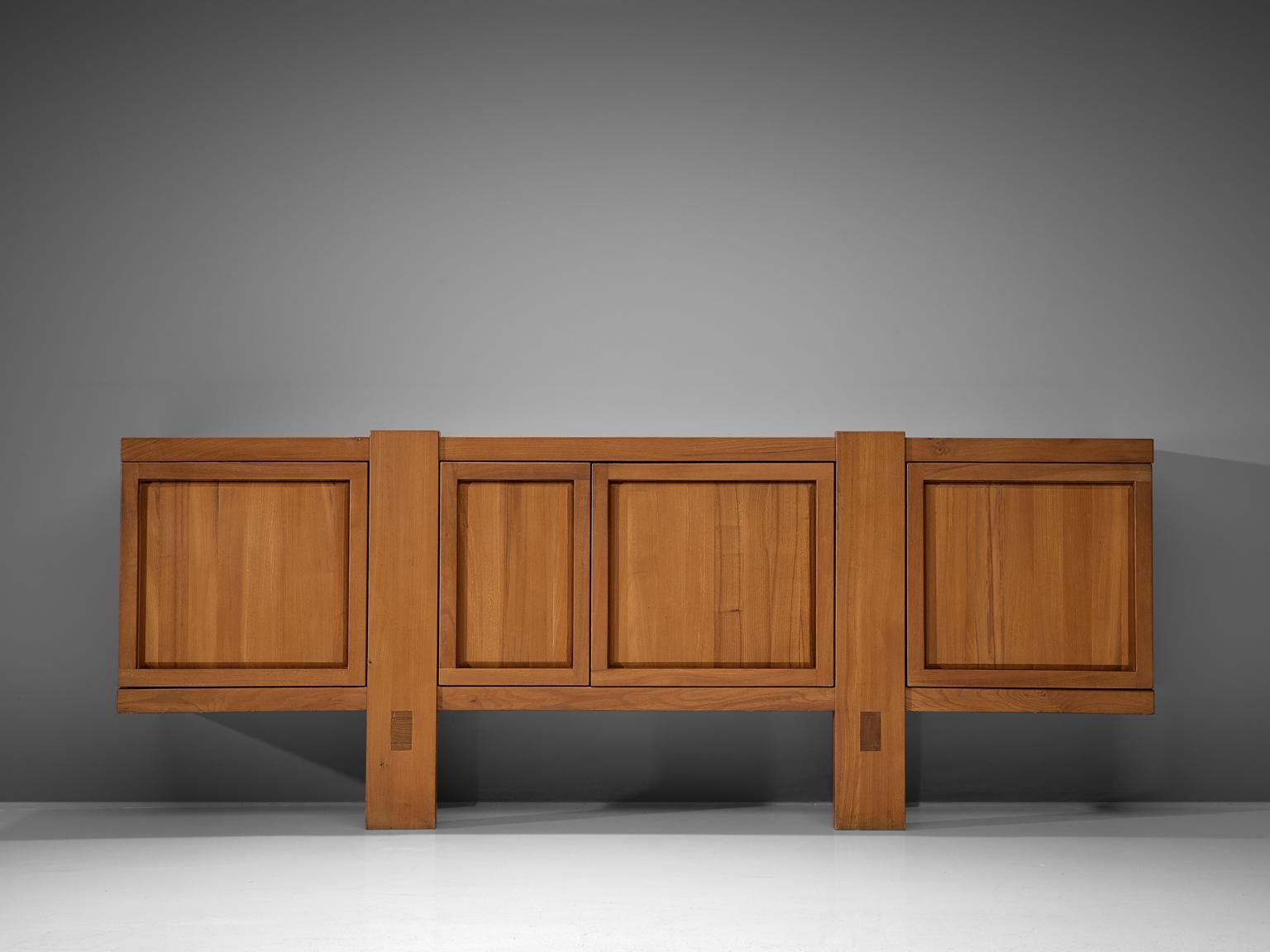 Pierre Chapo, sideboard model R16, elm wood, France, late 1960s.

This exquisitely crafted credenza combines a simplified yet complex design combined with nifty, solid construction details that characterize Chapo's work. Chapo responded to a