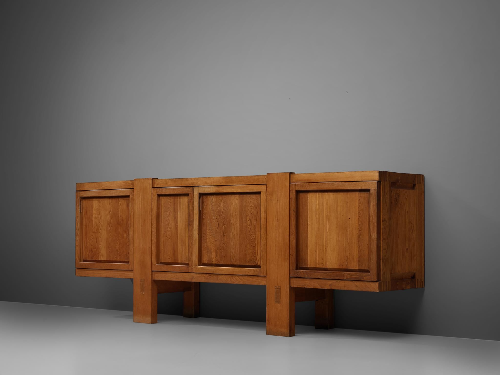Pierre Chapo, sideboard model R16, elmwood, France, late 1960s

This exquisitely crafted credenza combines a simplified yet complex design combined with nifty, solid construction details that characterize Chapo's work. Chapo responded to a