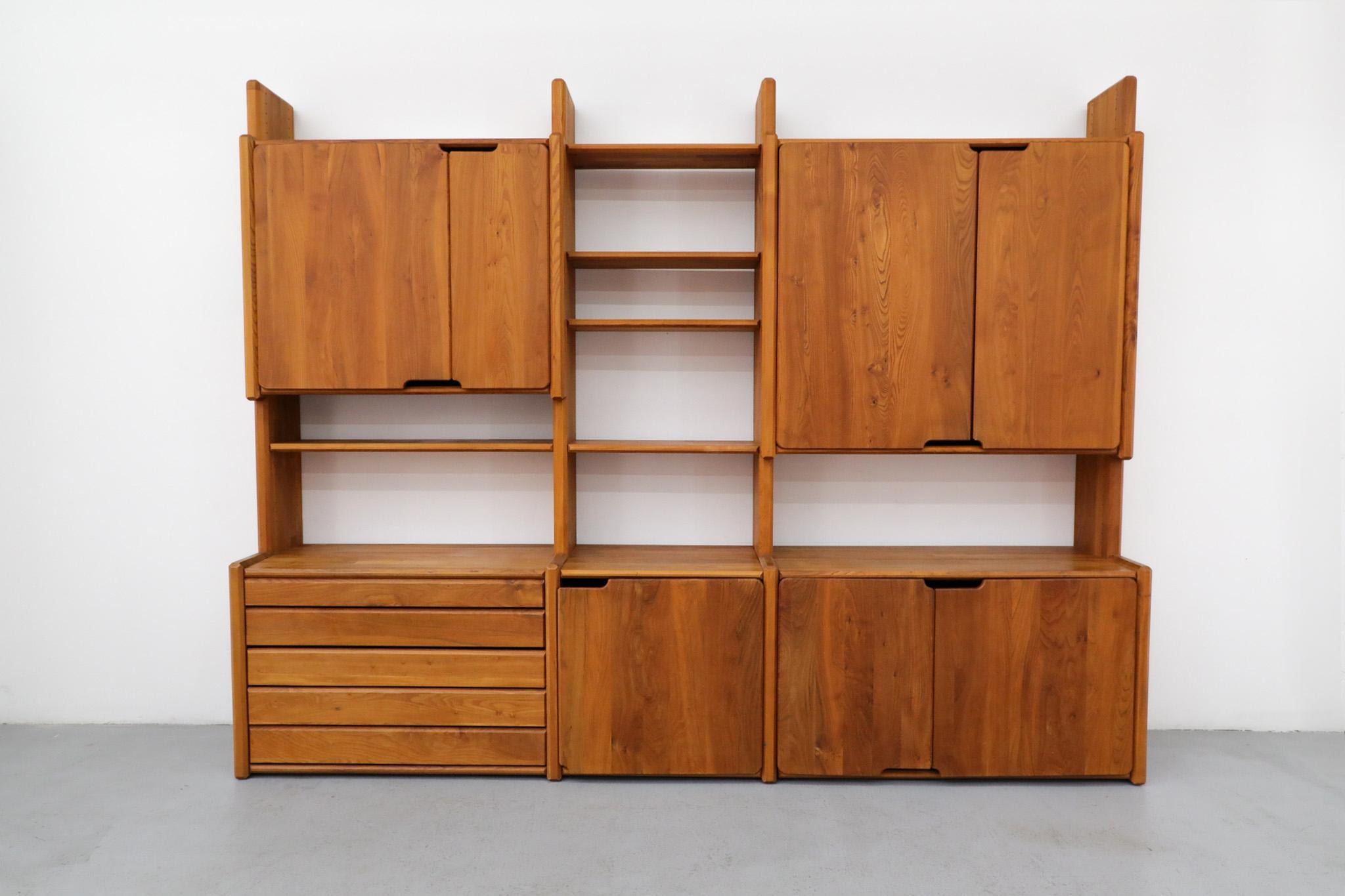 The GO system was created by Pierre Chapo in 1983 and can be considered an end-of-career highlight for the highly influential French designer. The piece is a visually appealing and infinitely adaptable bookshelf using a configuration of solid elm
