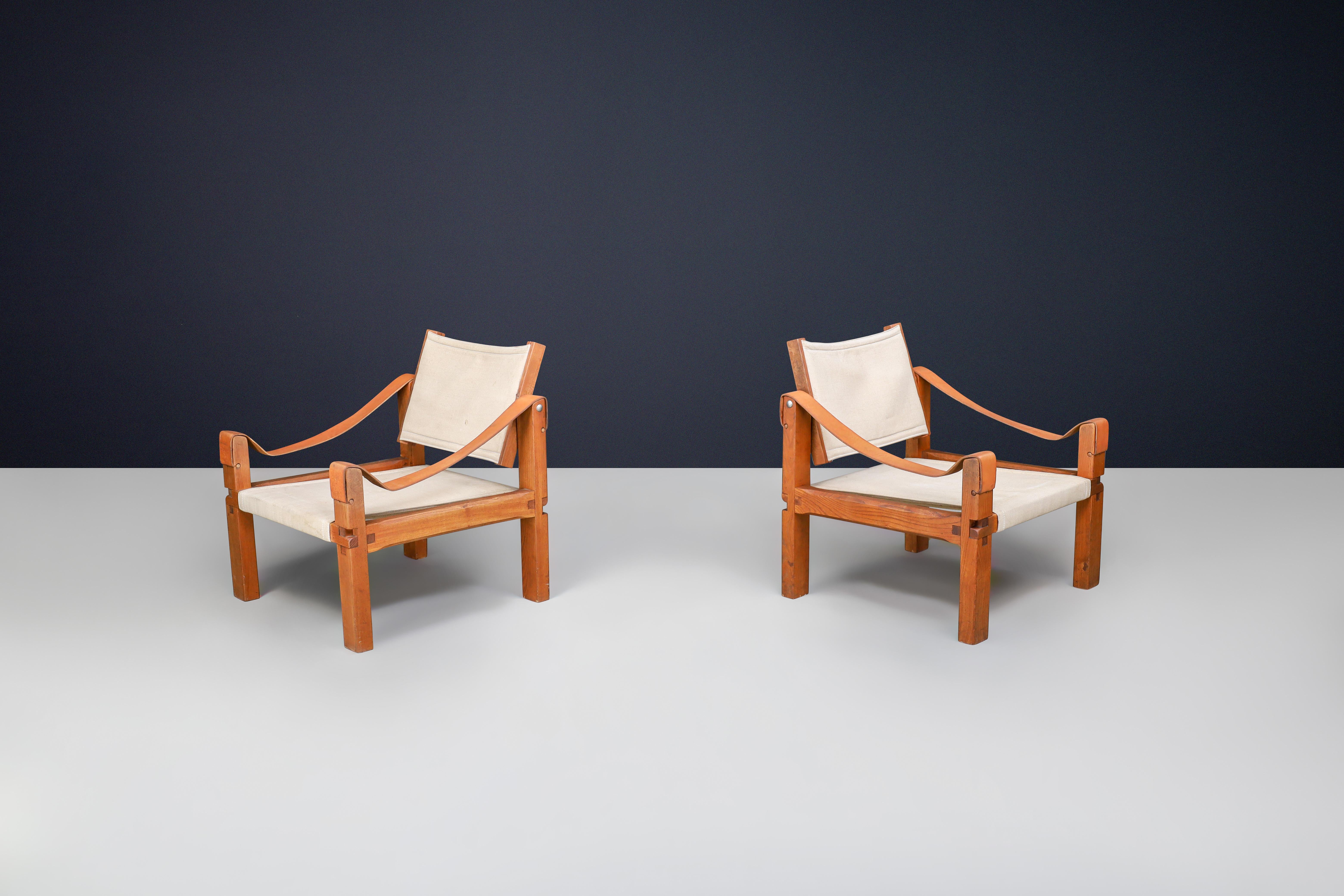 Pierre Chapo, Paire de fauteuils modèle 'S10' Orme, cuir et toile France 1960s

Cette paire de fauteuils 