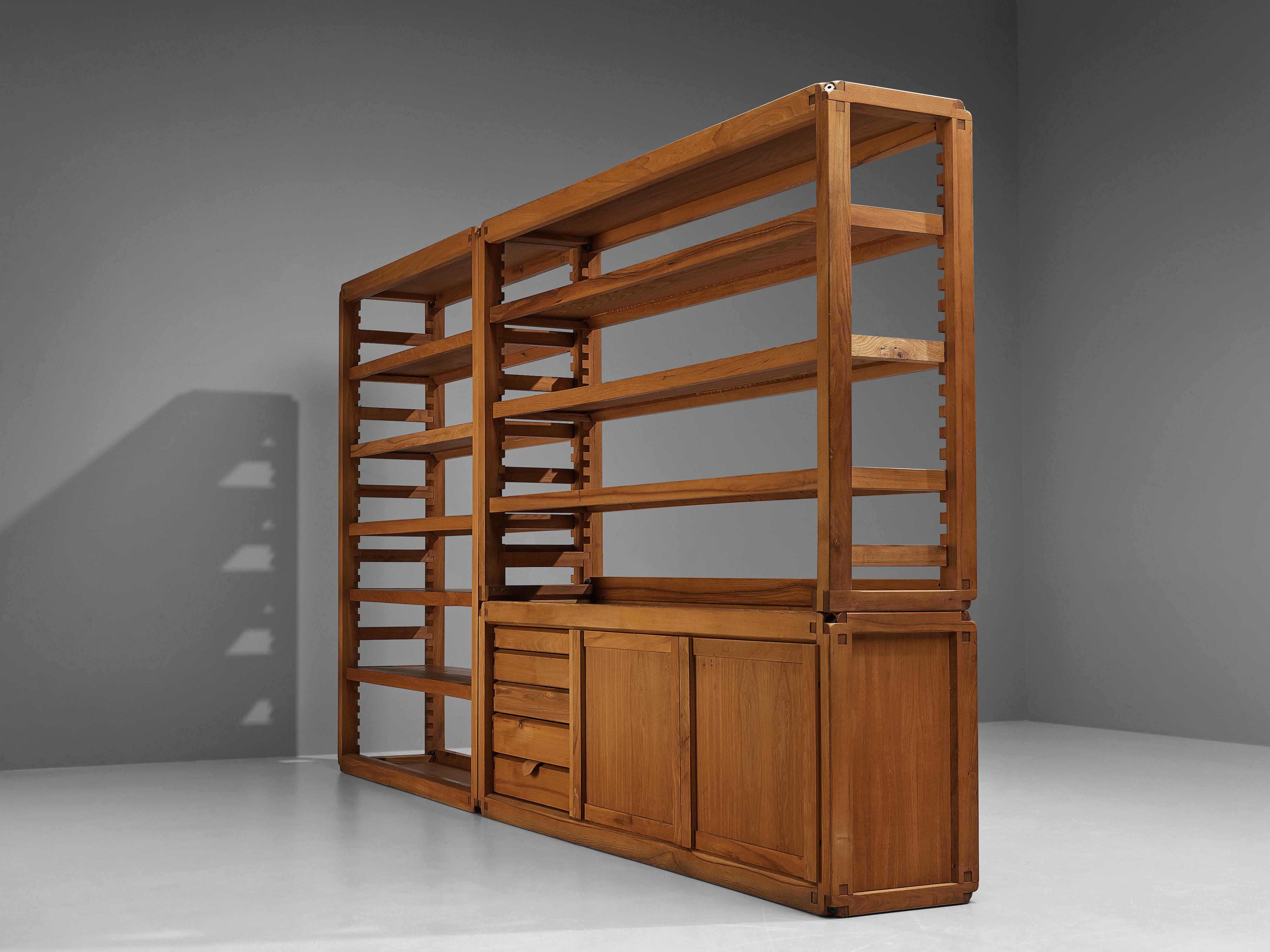 Pierre Chapo, pair of bookcases model 'B10', elm, France, 1960s

These versatile shelves model 'B10' are designed by Pierre Chapo. The shelving system was created in the 1960s. This robust and solid bookcase consists of a closed compartment with